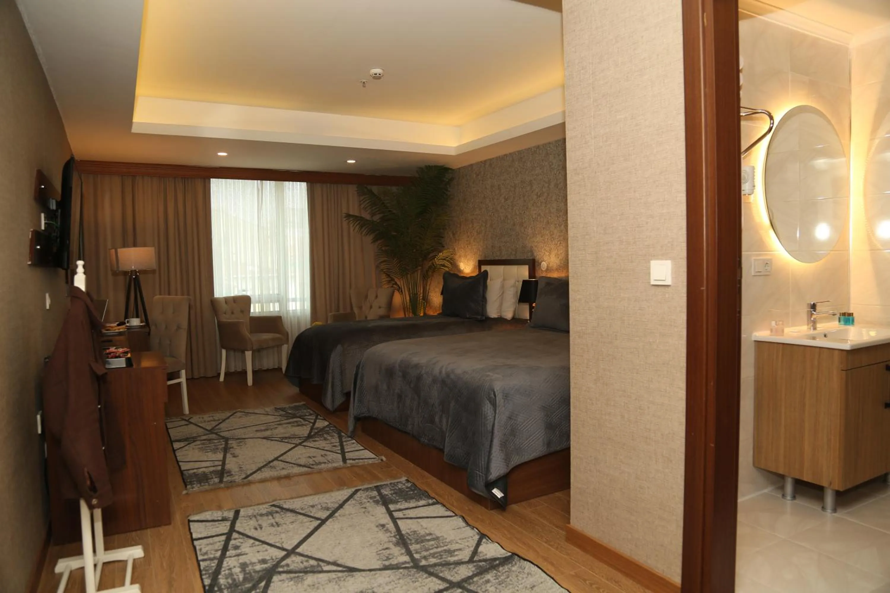 Photo of the whole room, Bed in Cebeci Grand Hotel