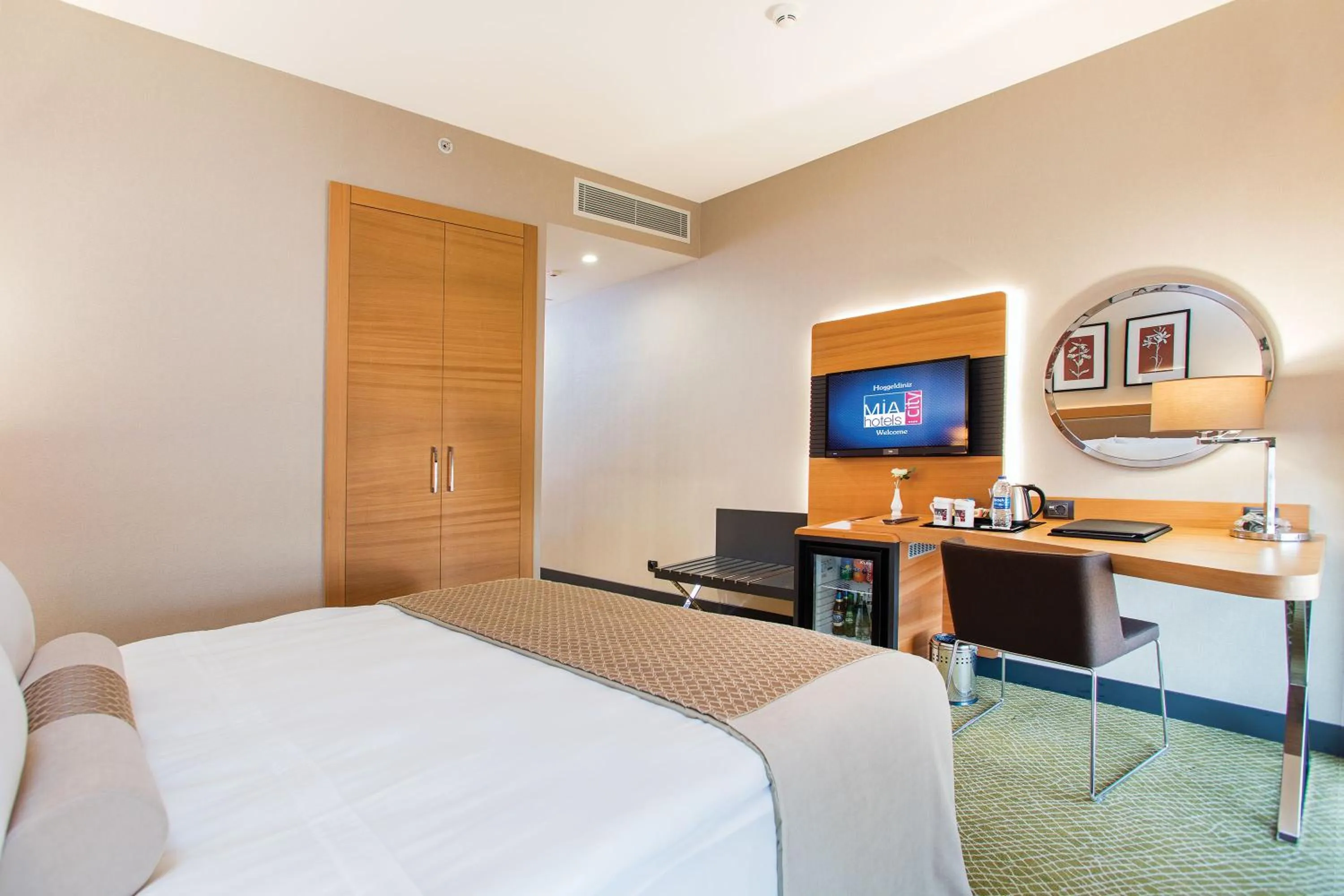 TV and multimedia, Bed in Mia City Hotel