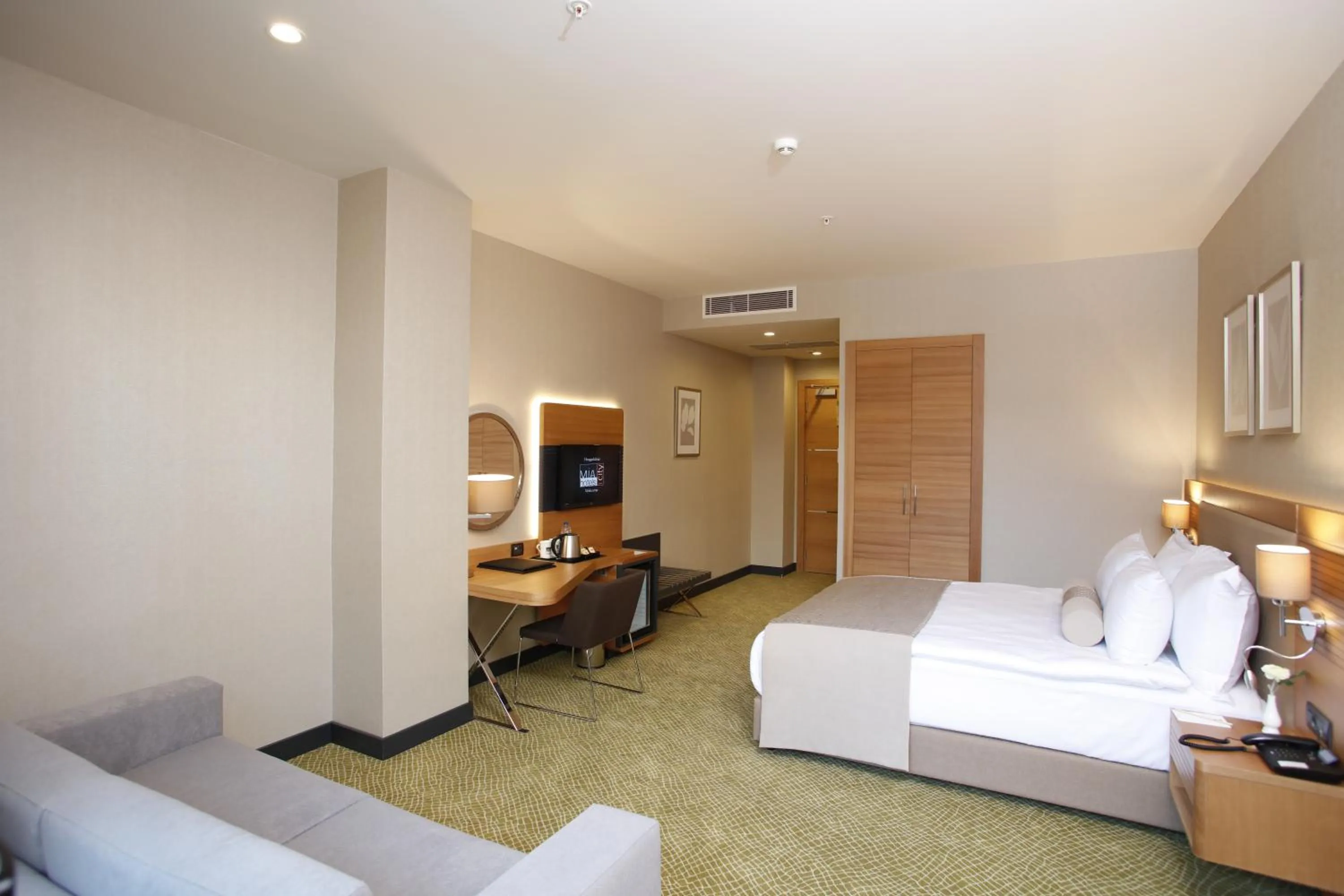 Photo of the whole room, Bed in Mia City Hotel