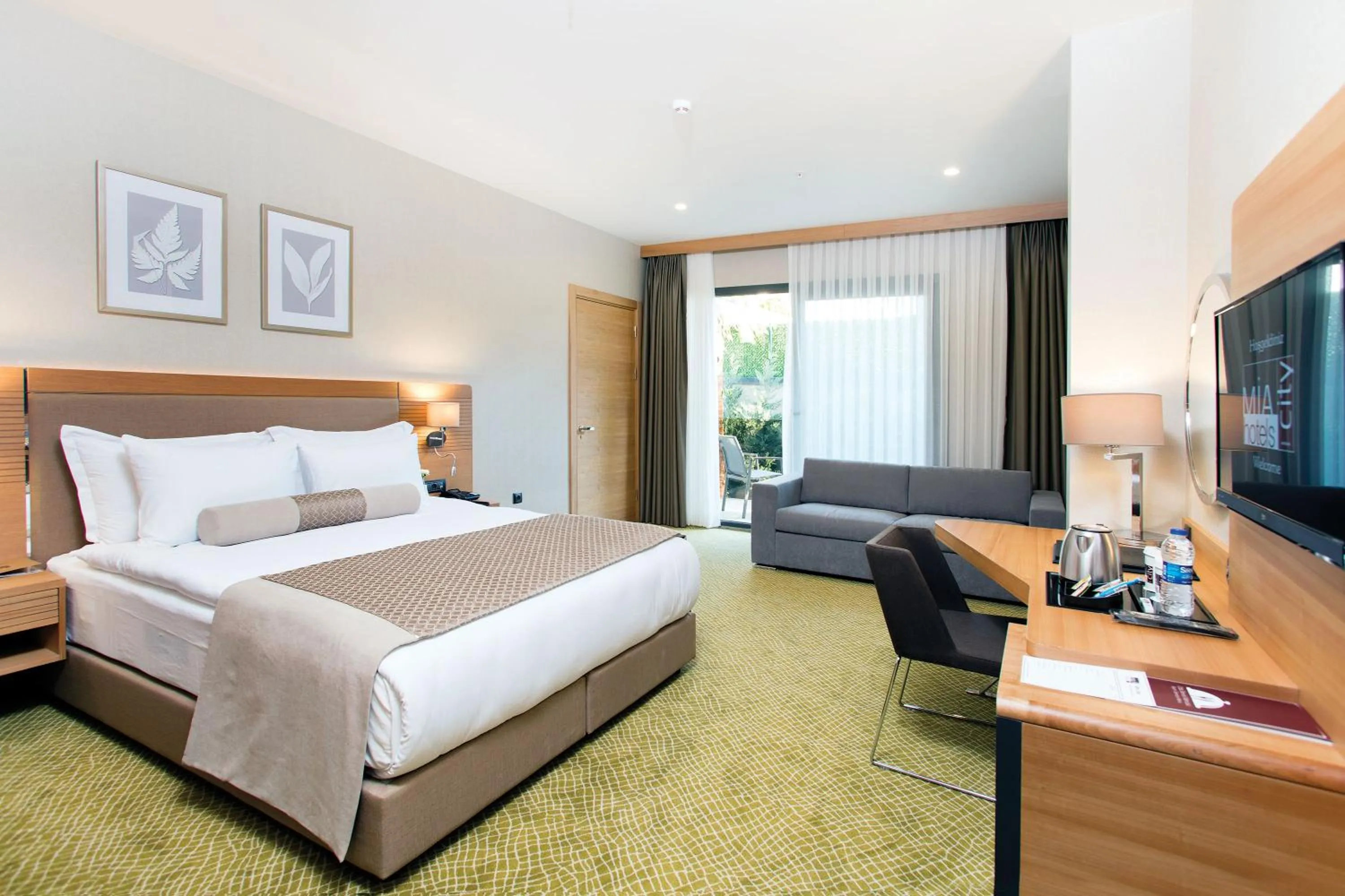 Photo of the whole room, Bed in Mia City Hotel