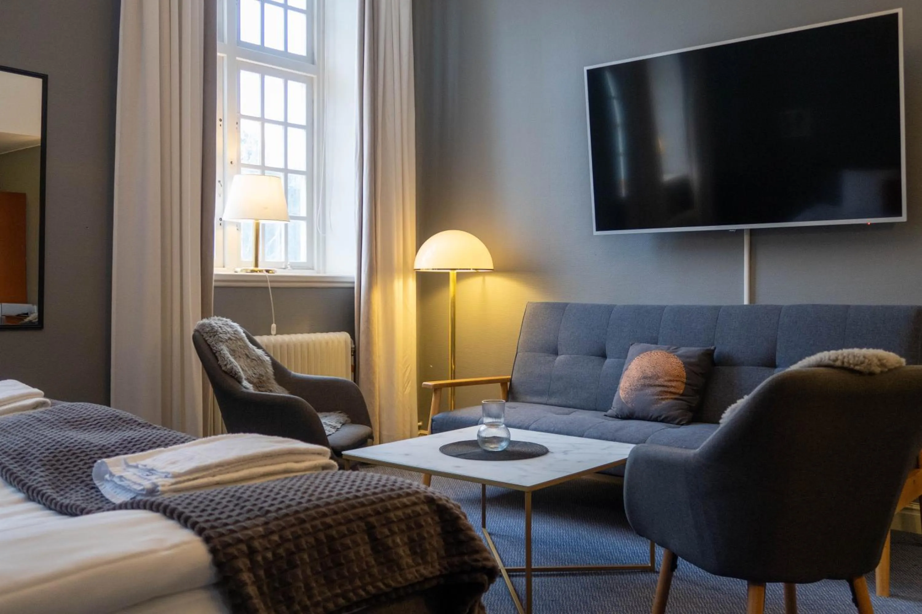 Living room, Bed in Furunäset Hotell & Konferens