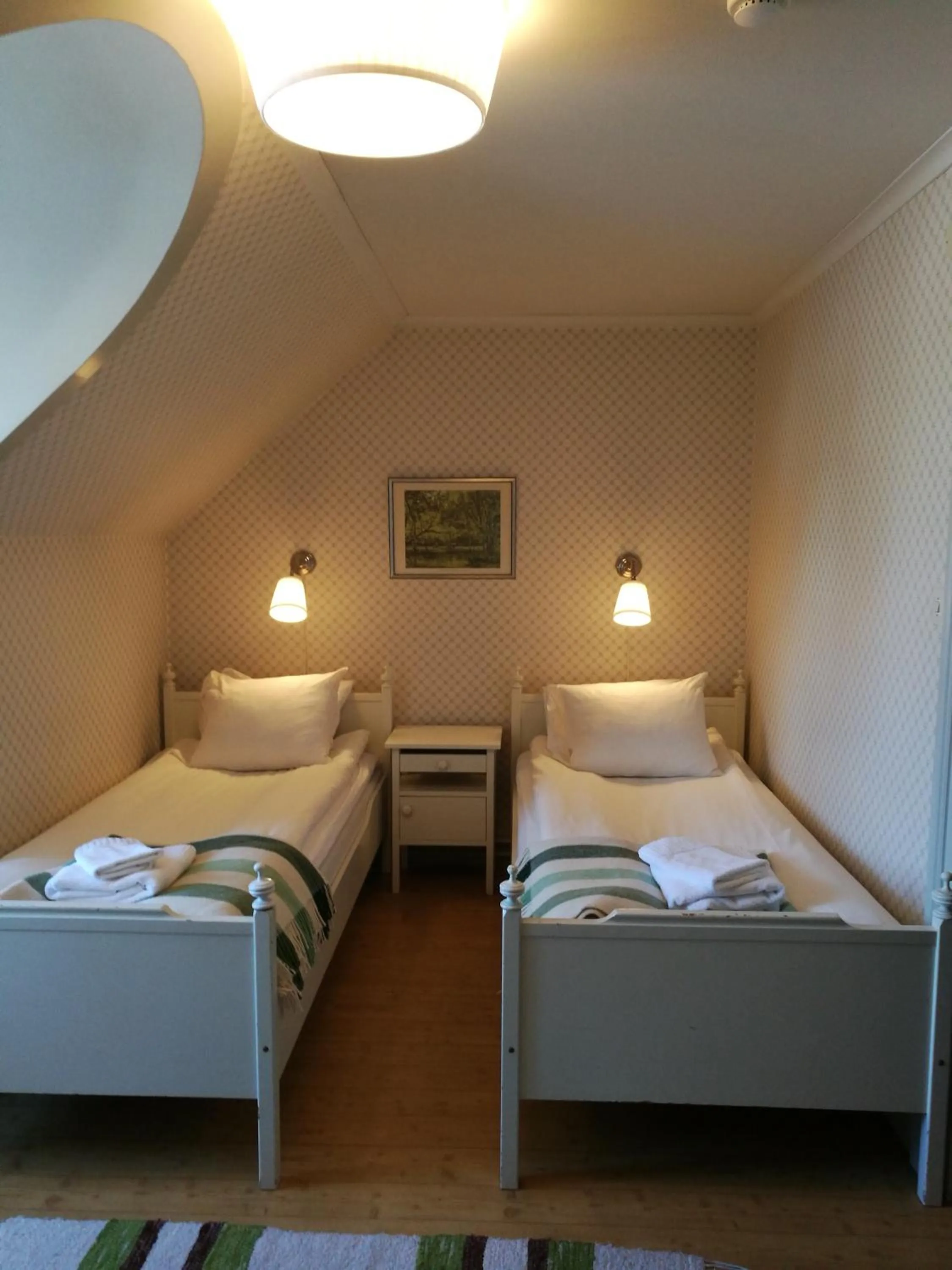 Photo of the whole room, Bed in Wärdshuset Gammel Tammen Österbybruk