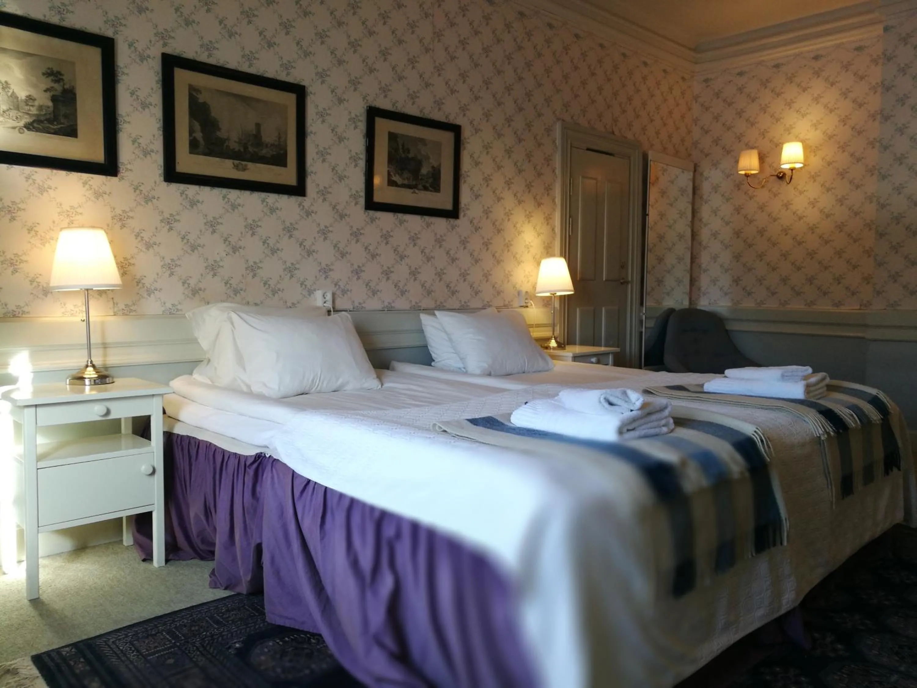 Bed in Wärdshuset Gammel Tammen Österbybruk