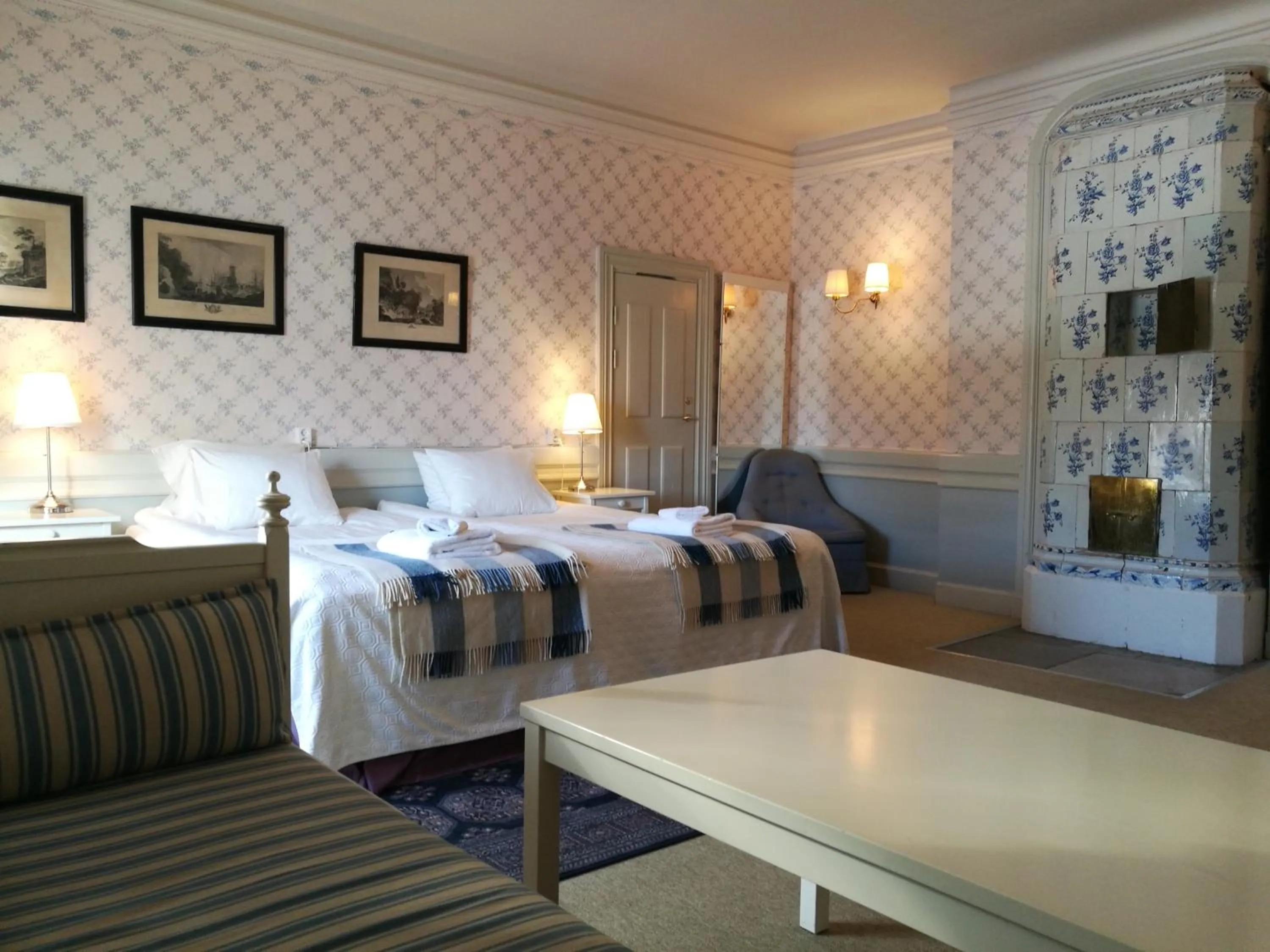 Photo of the whole room, Bed in Wärdshuset Gammel Tammen Österbybruk