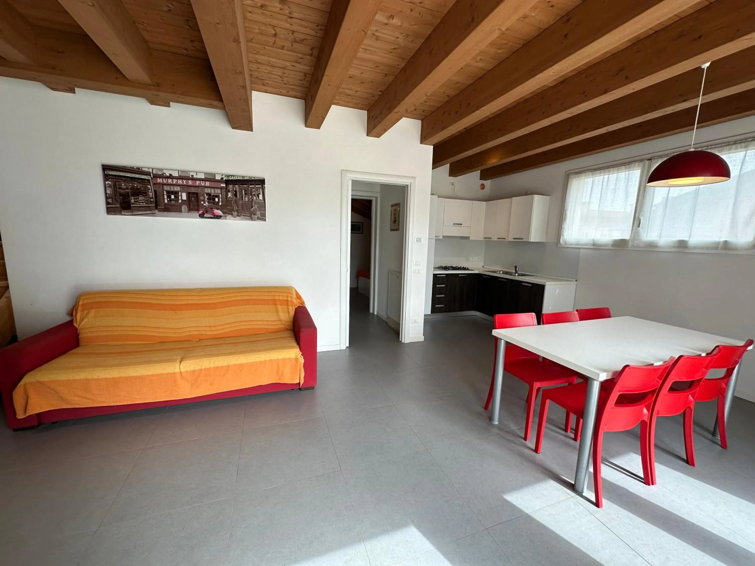 Living room, Bed in Attico Concordia - Agenzia Cocal