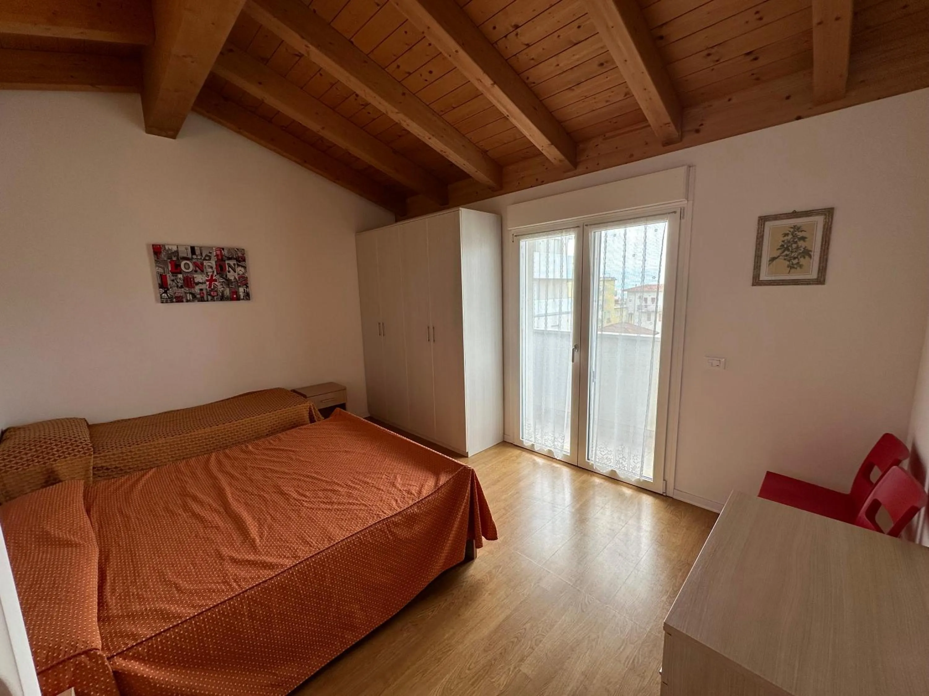 Photo of the whole room, Bed in Attico Concordia - Agenzia Cocal