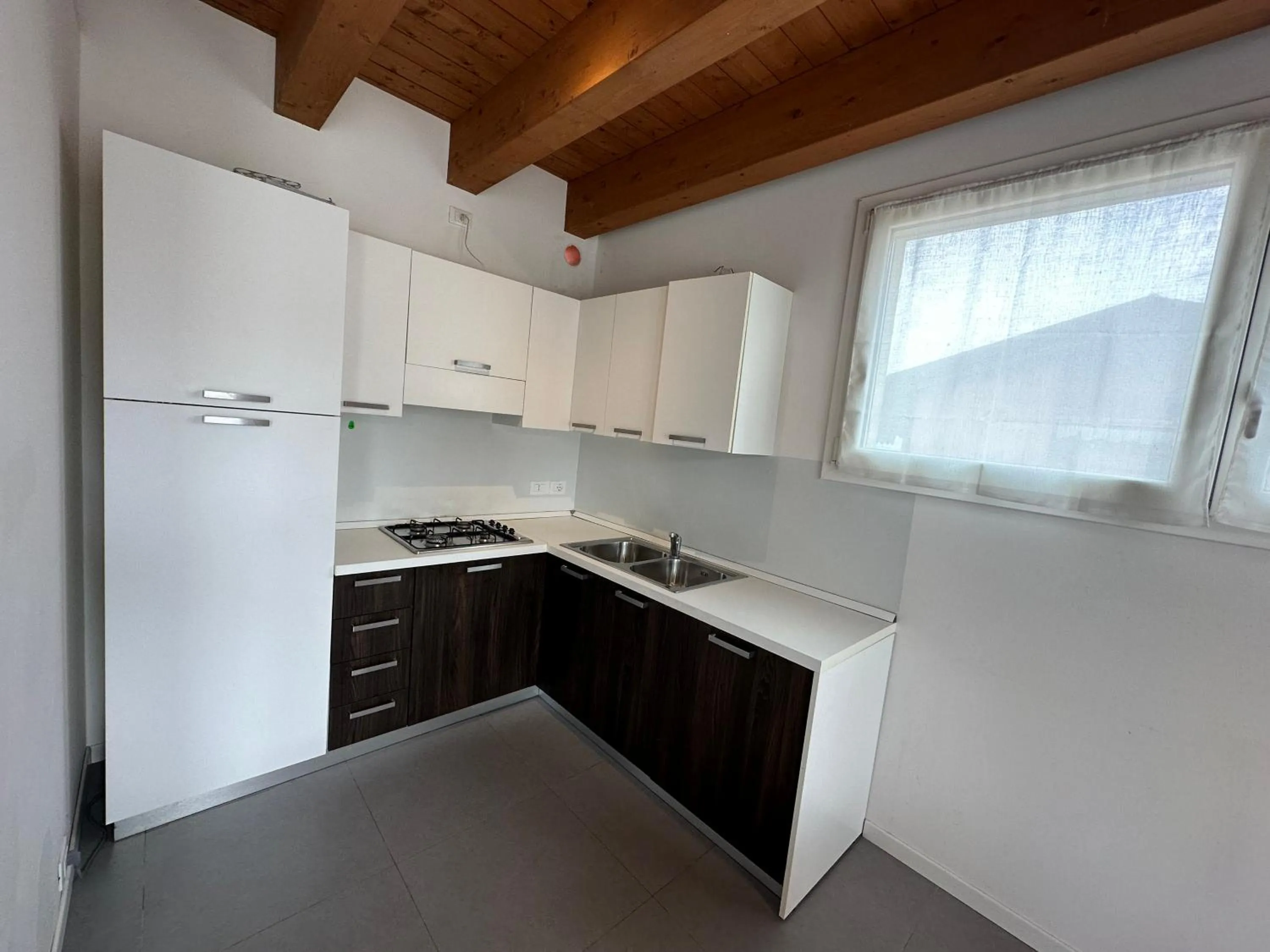 Kitchen or kitchenette in Attico Concordia - Agenzia Cocal