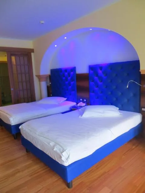 Bed in Hotel Alexander