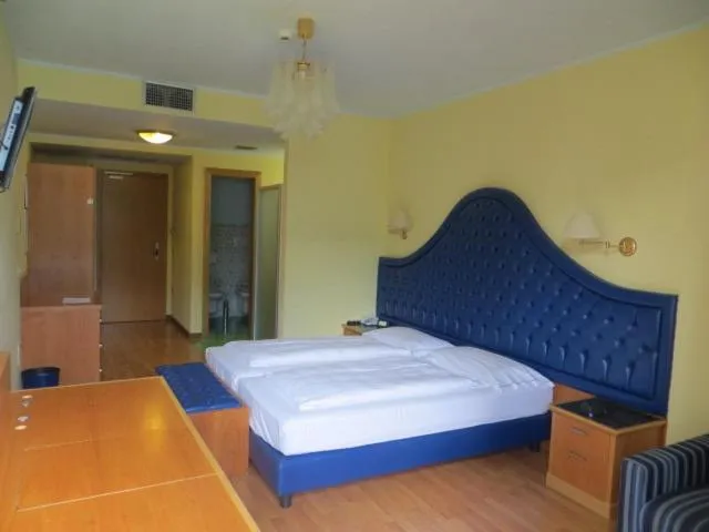 Bed in Hotel Alexander