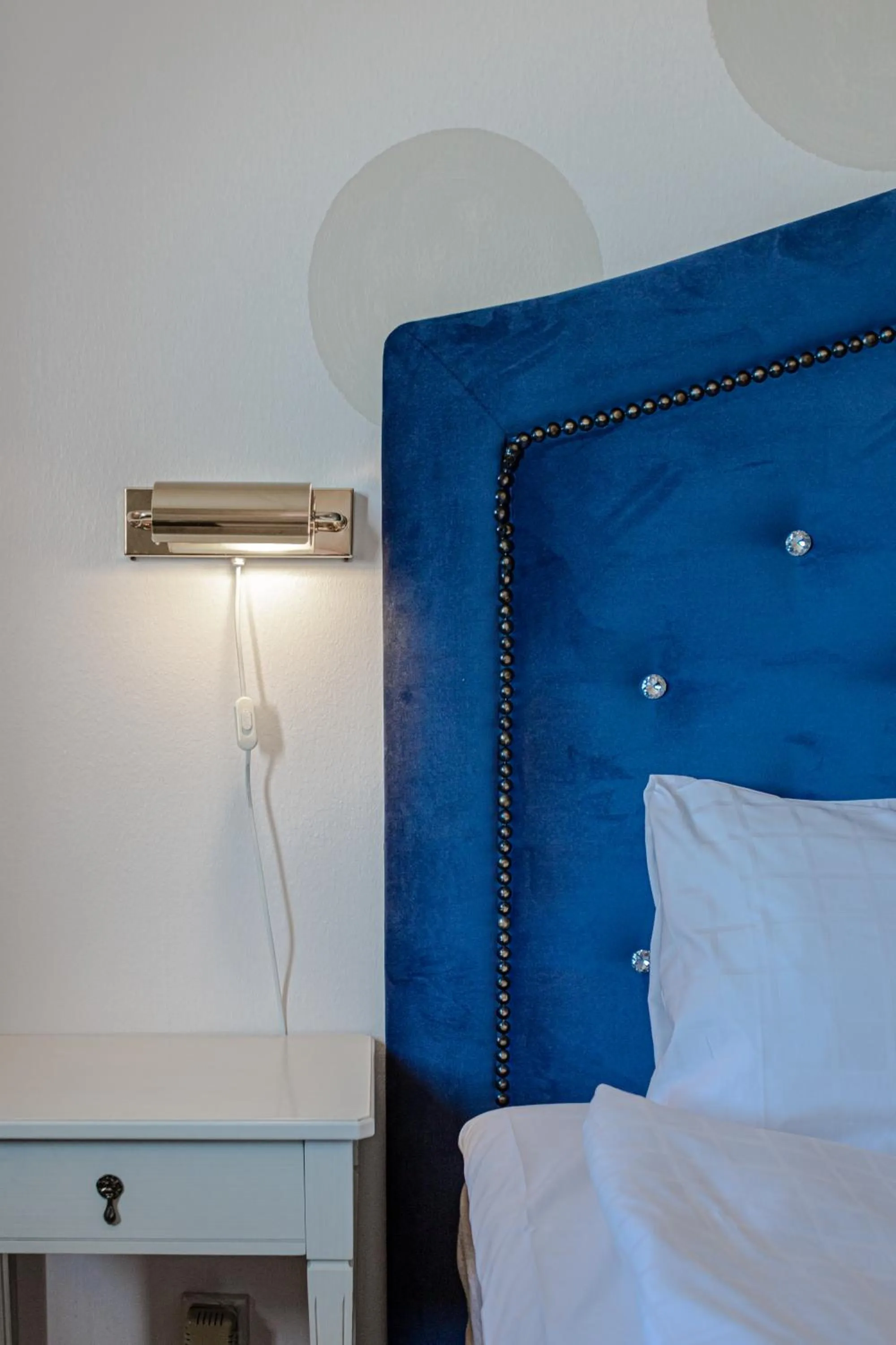 Property building, Bed in First Hotel Olofström