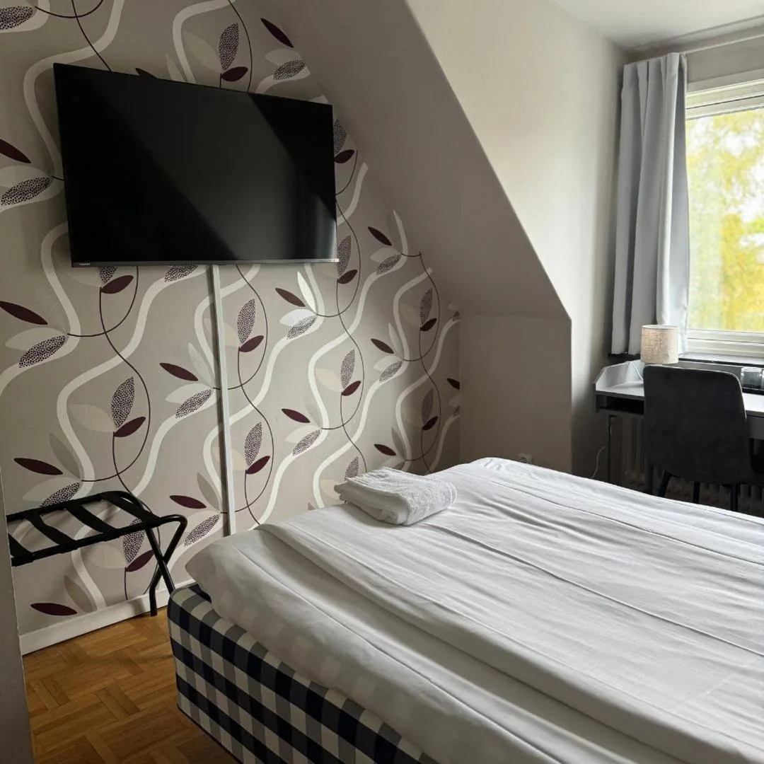 Bed in Hotell Gillet i Köping