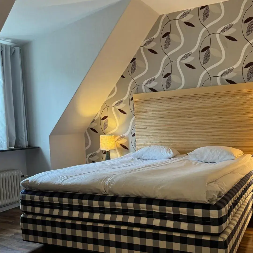 Standard Quadruple Room in Hotell Gillet i Köping Standard Quadruple Room in Hotell Gillet i Köping