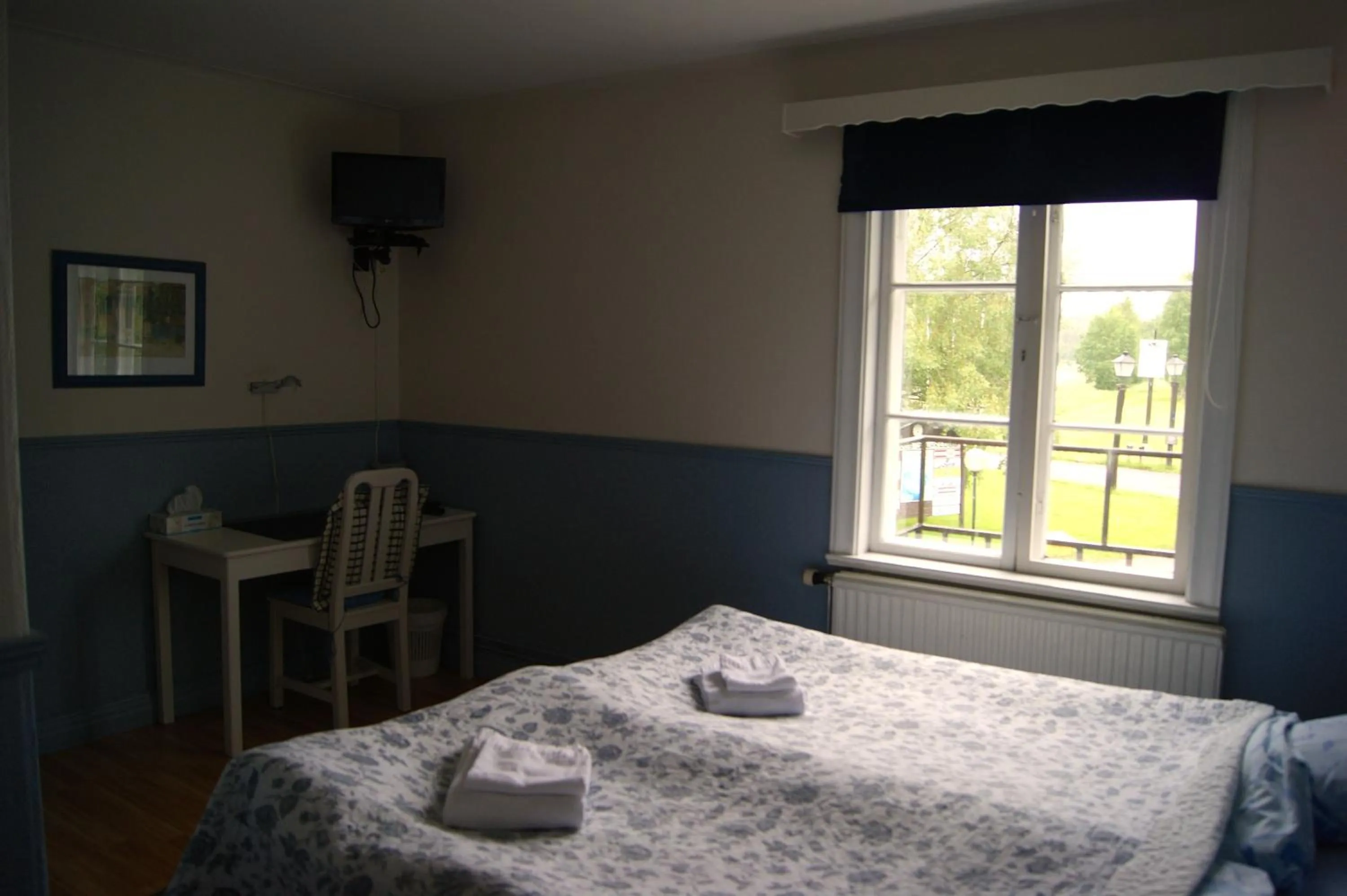 Photo of the whole room, Bed in Lugnet Malung Hotell