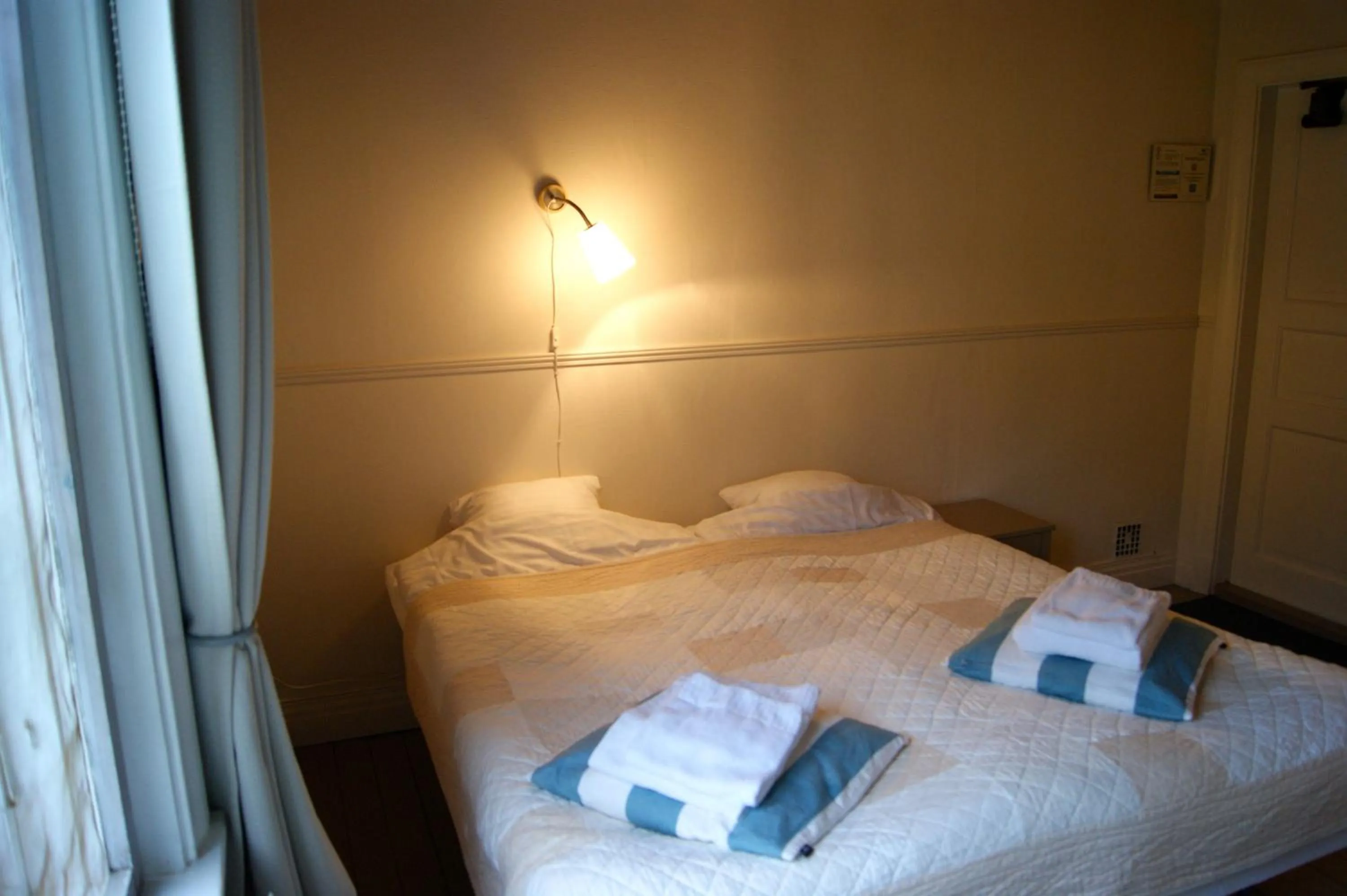 Photo of the whole room, Bed in Lugnet Malung Hotell