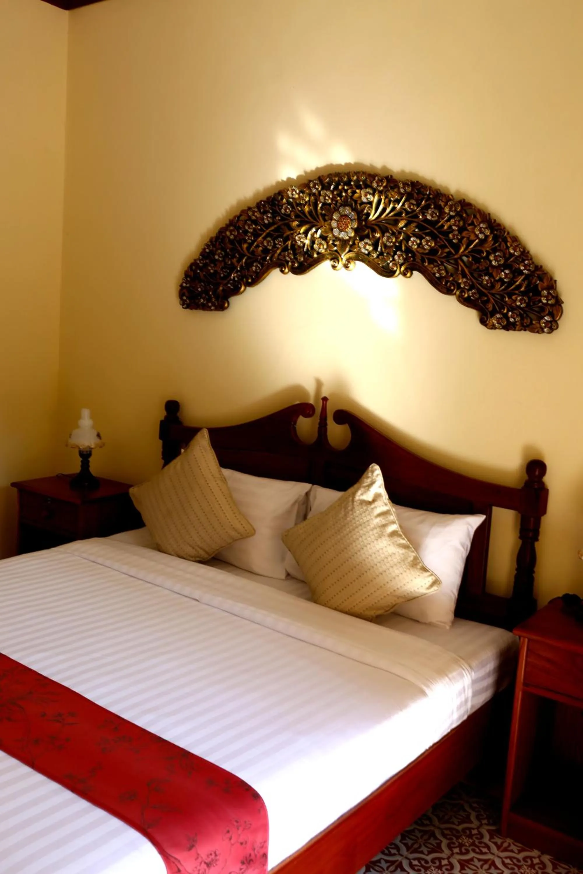 Bed in Le Jardin Hotel