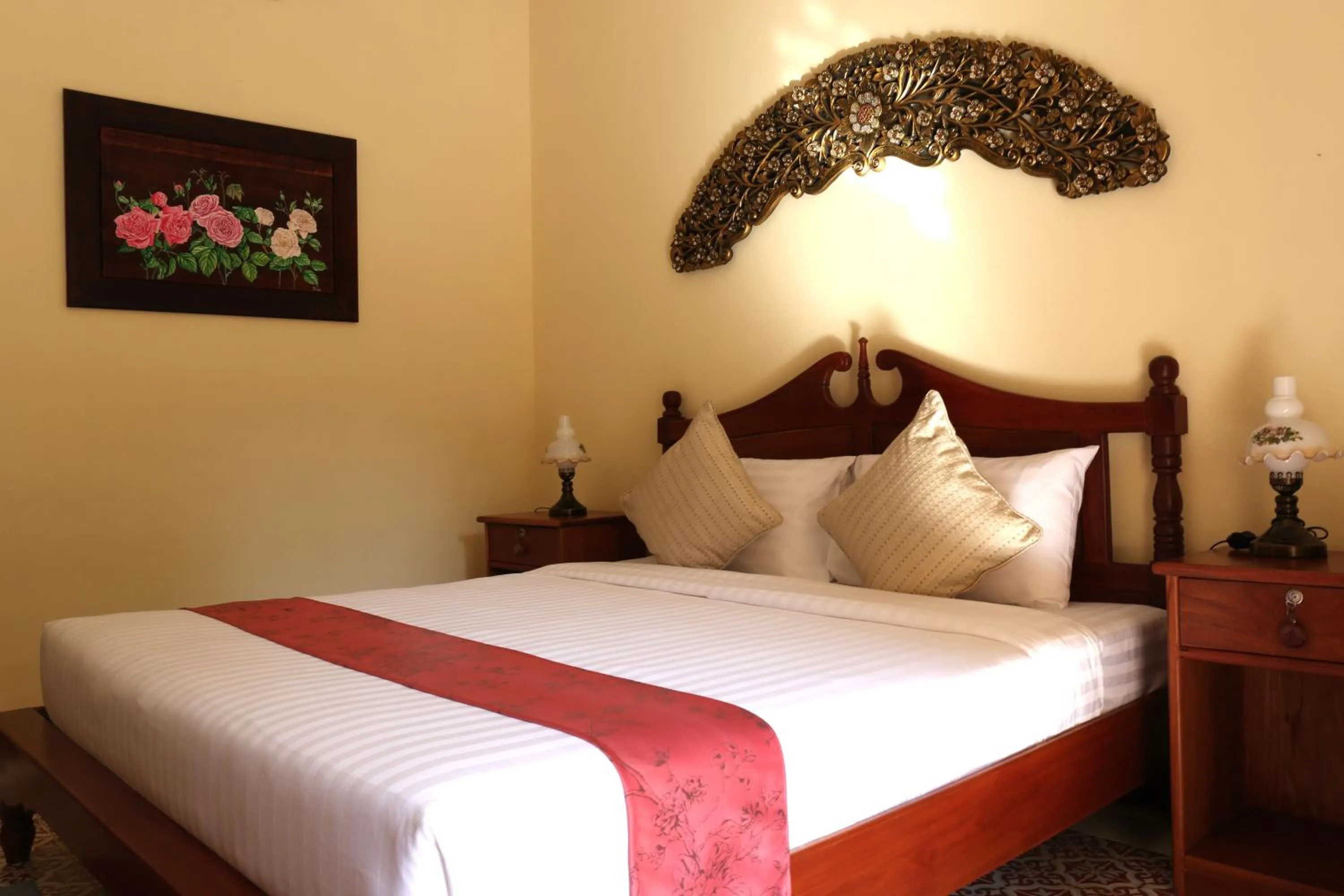 Bed in Le Jardin Hotel