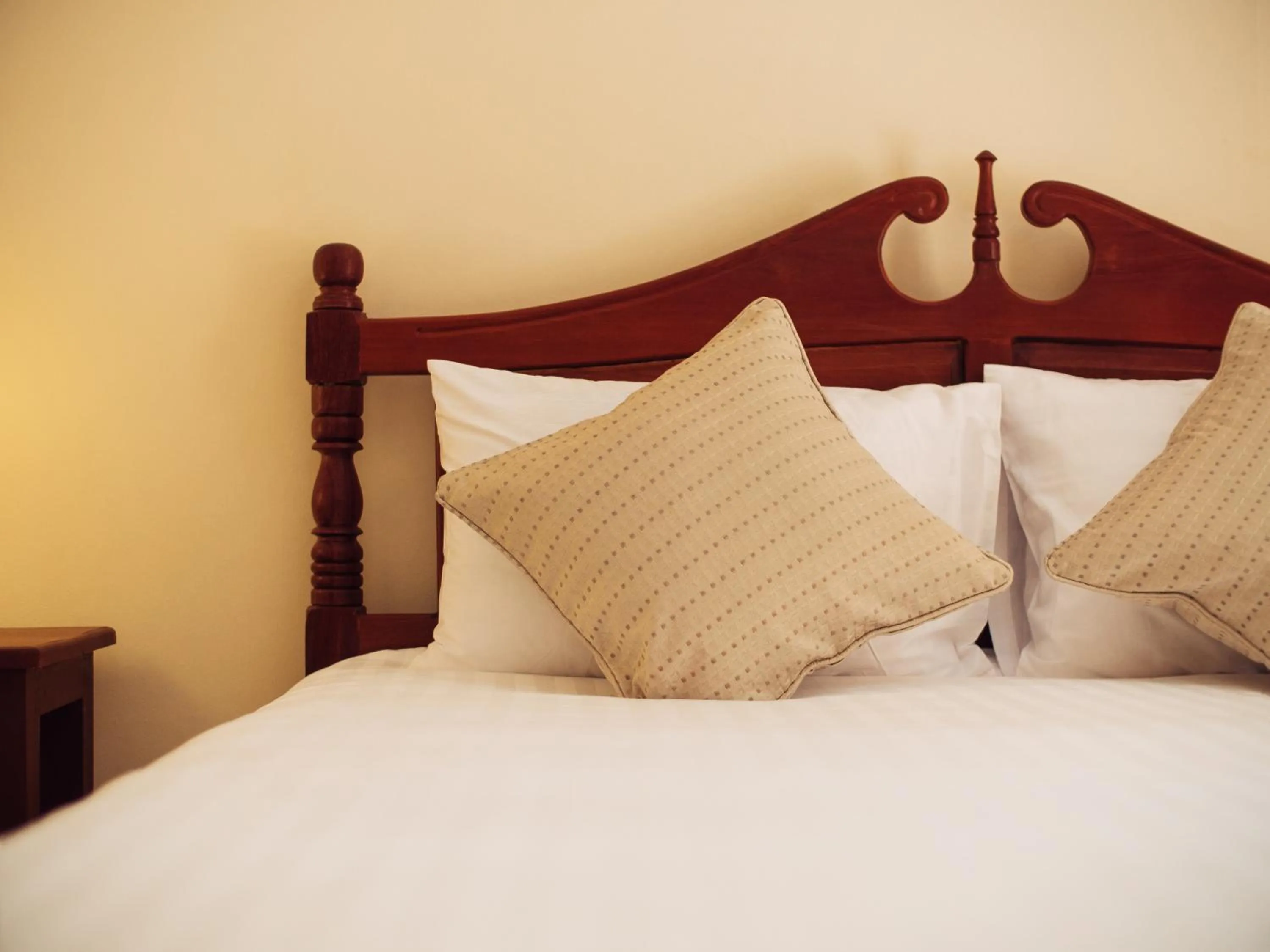 Bed in Le Jardin Hotel