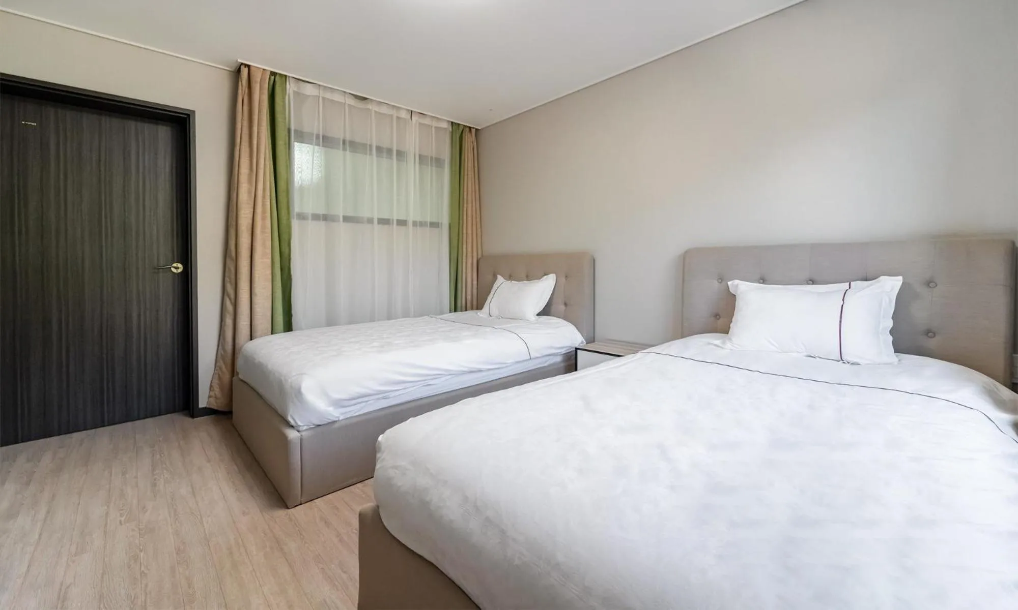 Bed in Kylin Villa resort Jeju