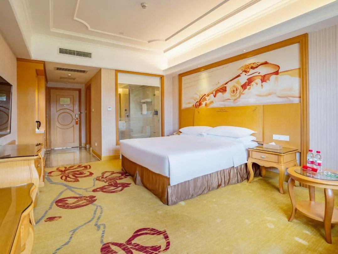 Bed in Vienna Hotel Shenzhen Guangming Guangqiao Road Tianliao