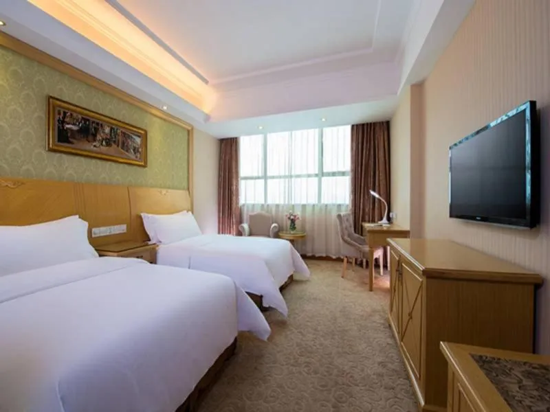 Bed in Vienna Hotel Longchuan