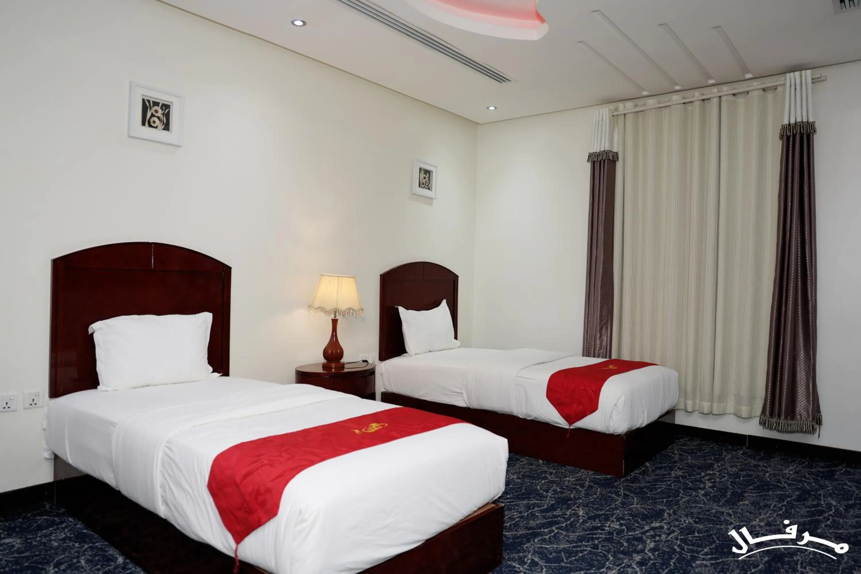 Bed in Merfal Serviced Apartments Royal