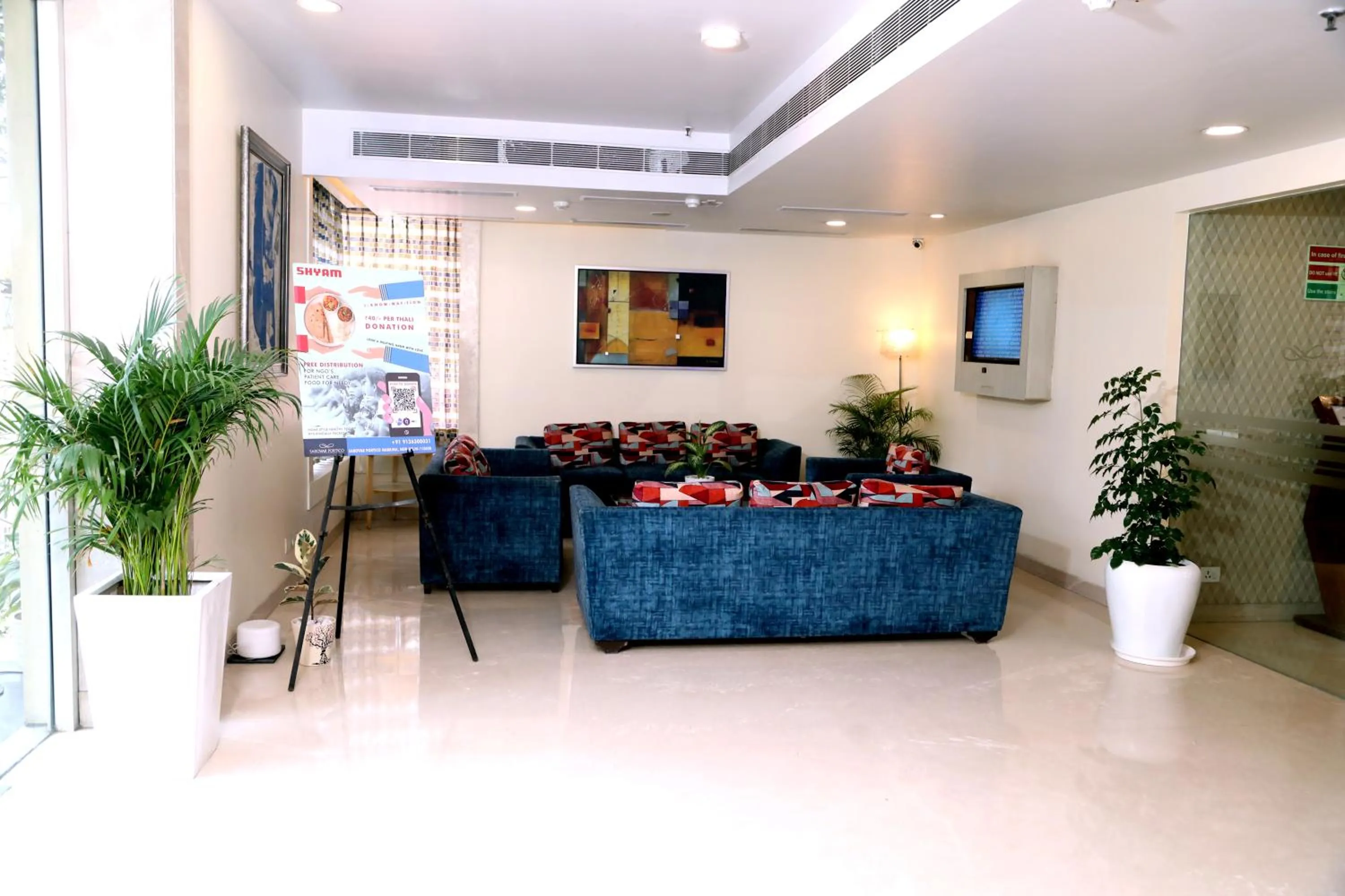 Seating area in Sarovar Portico Naraina, Hotel