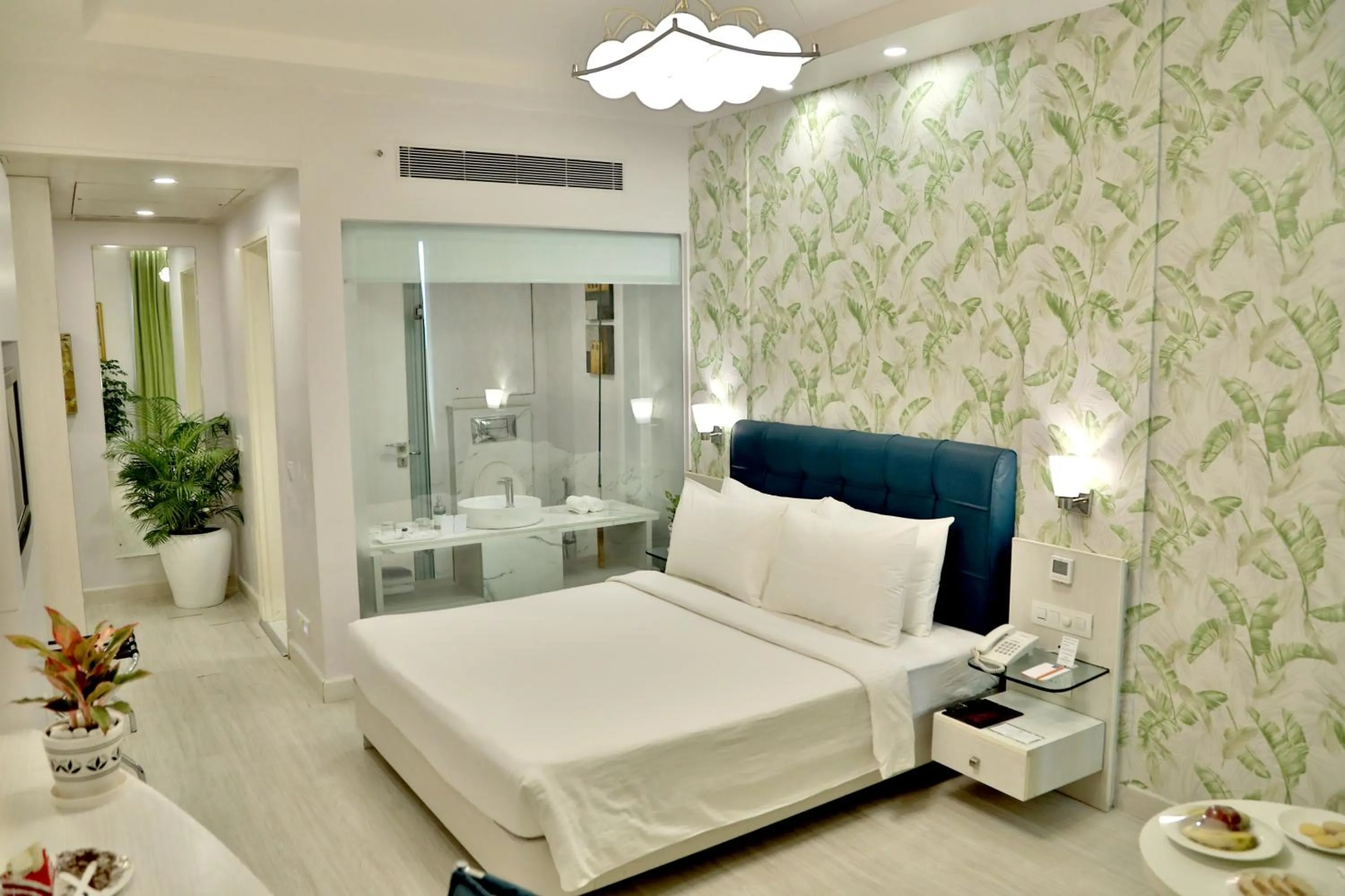 Bathroom, Bed in Sarovar Portico Naraina, Hotel