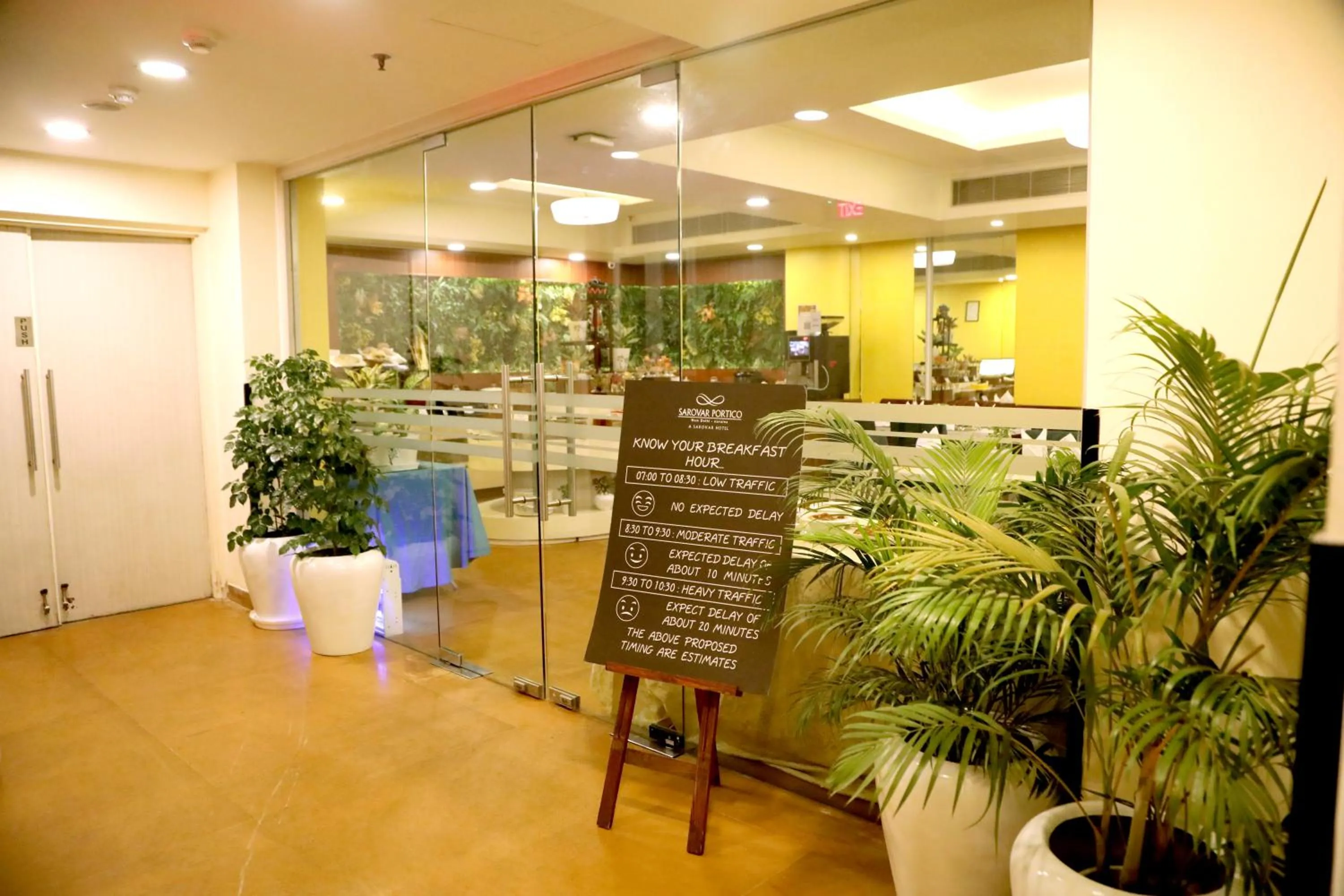 Restaurant/places to eat in Sarovar Portico Naraina, Hotel