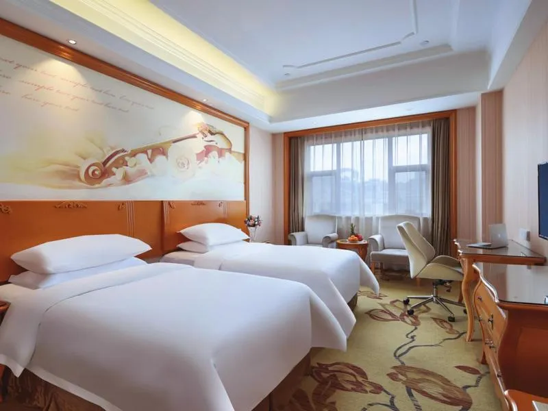 Bed in Vienna International Hotel Nanjing South Railway Station