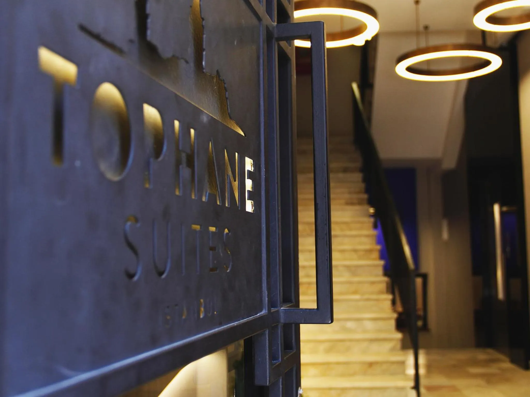 Property logo or sign in Tophane Suites