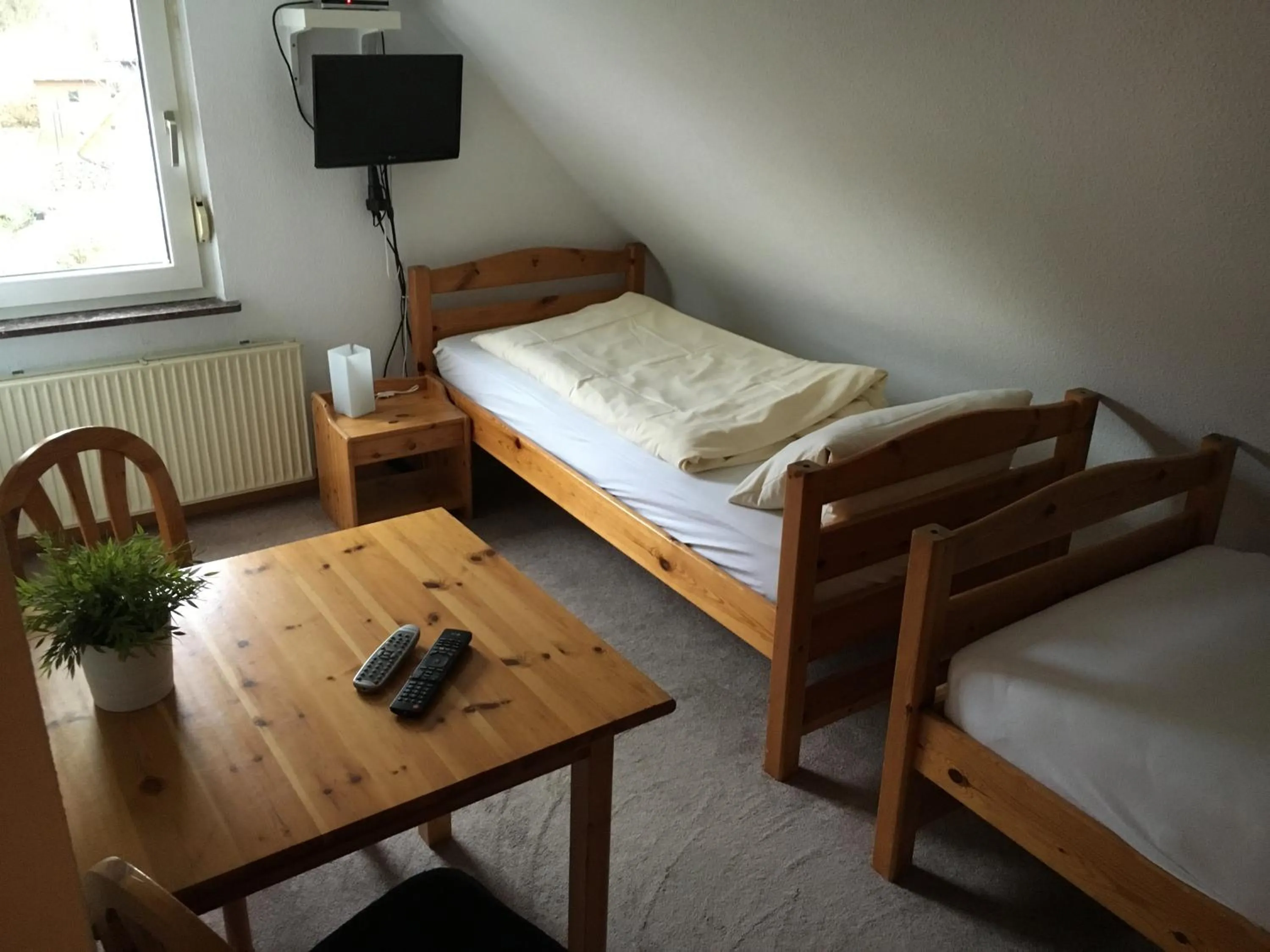 Photo of the whole room, Bed in Landgasthof Drei Eichen