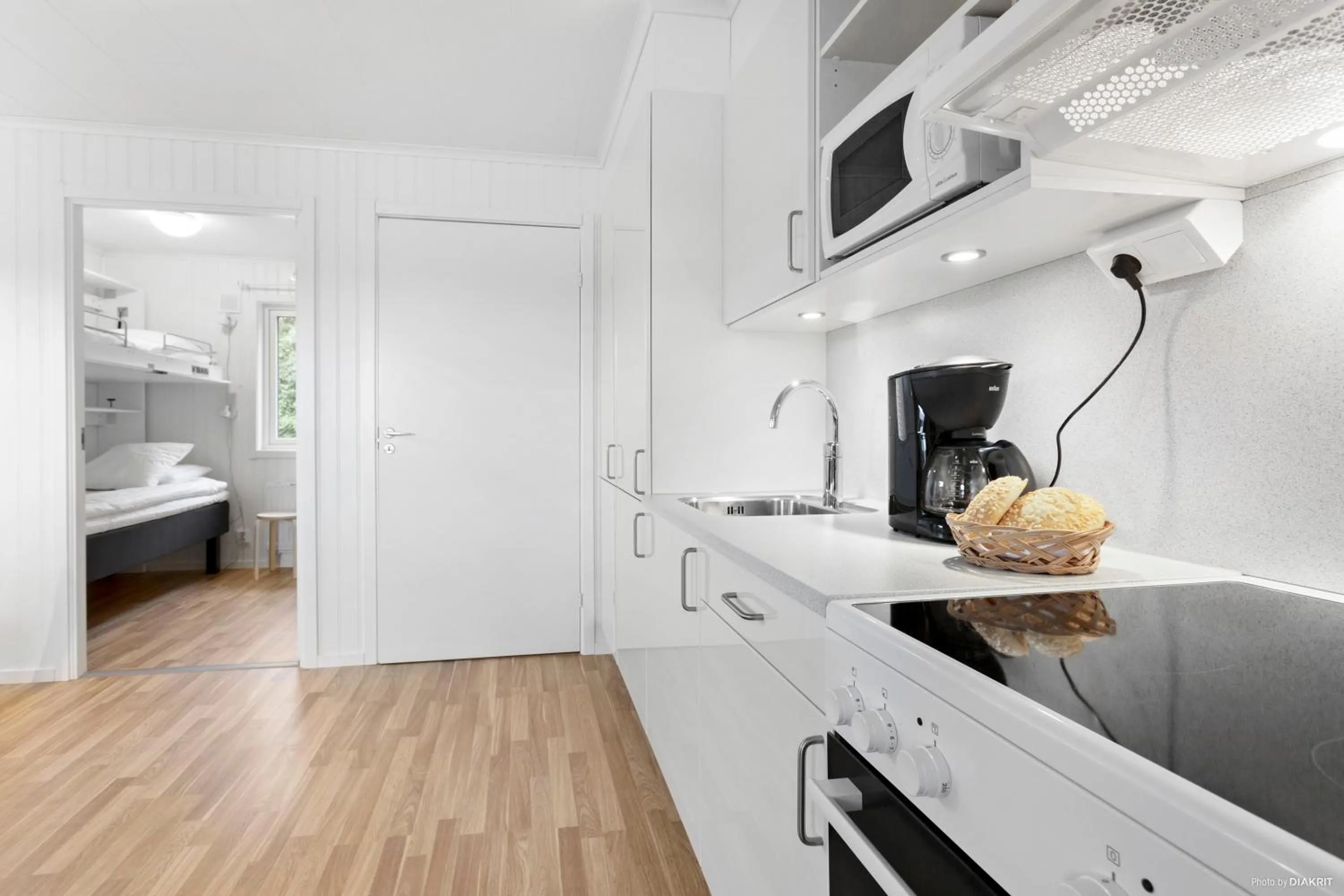 Kitchen or kitchenette, Bed in First Camp Nydala-Umeå