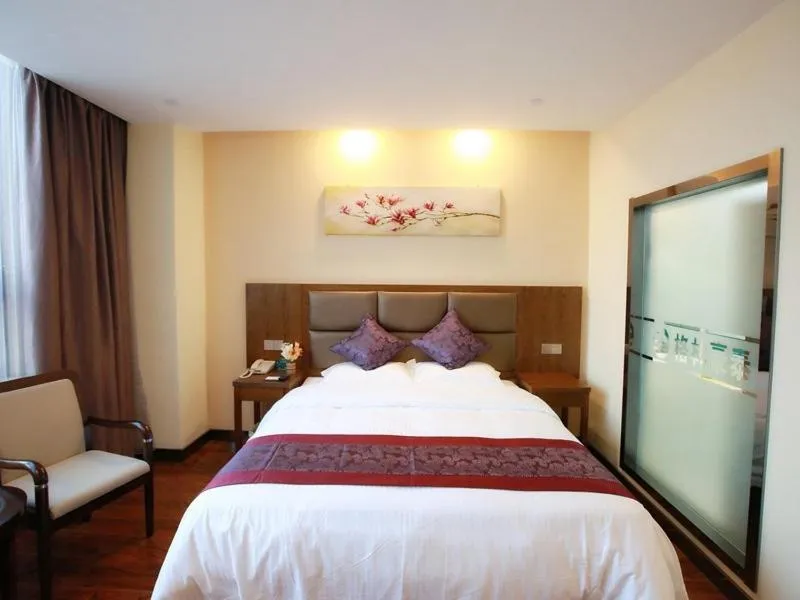 Bed in GreenTree Inn JiangSu NanTong HaiMen Shanghe Plaza Express Hotel