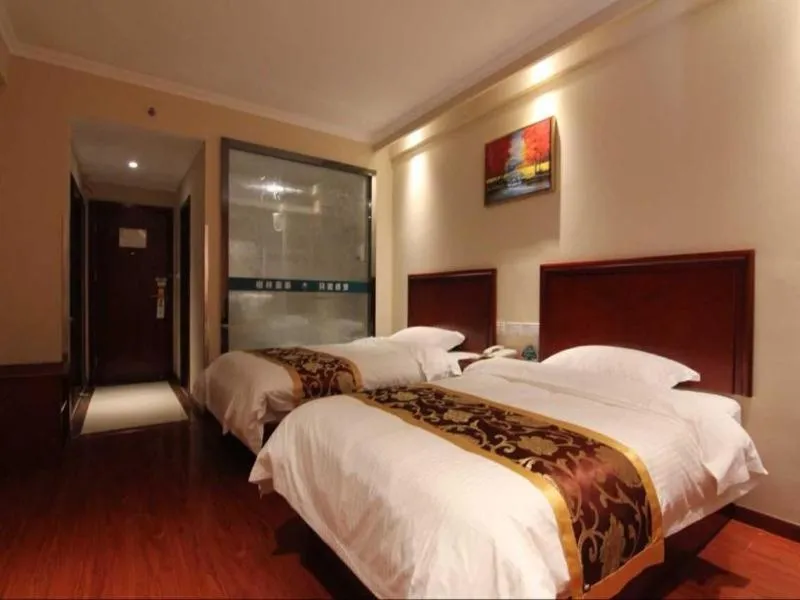Bed in GreenTree Inn JiangSu ZHenjiang Jurong Yalong Business Hotel