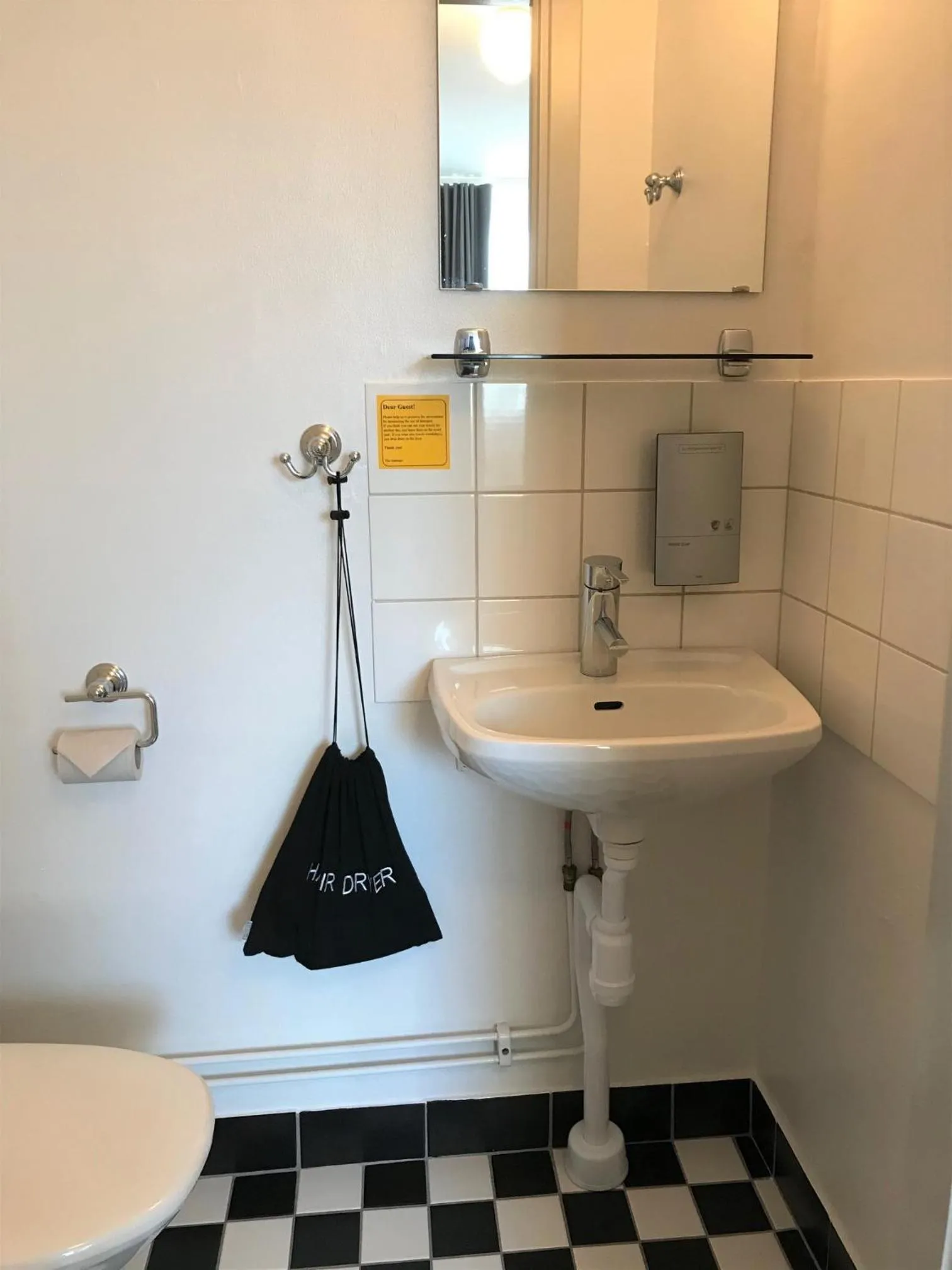 Toilet in Akademihotellet