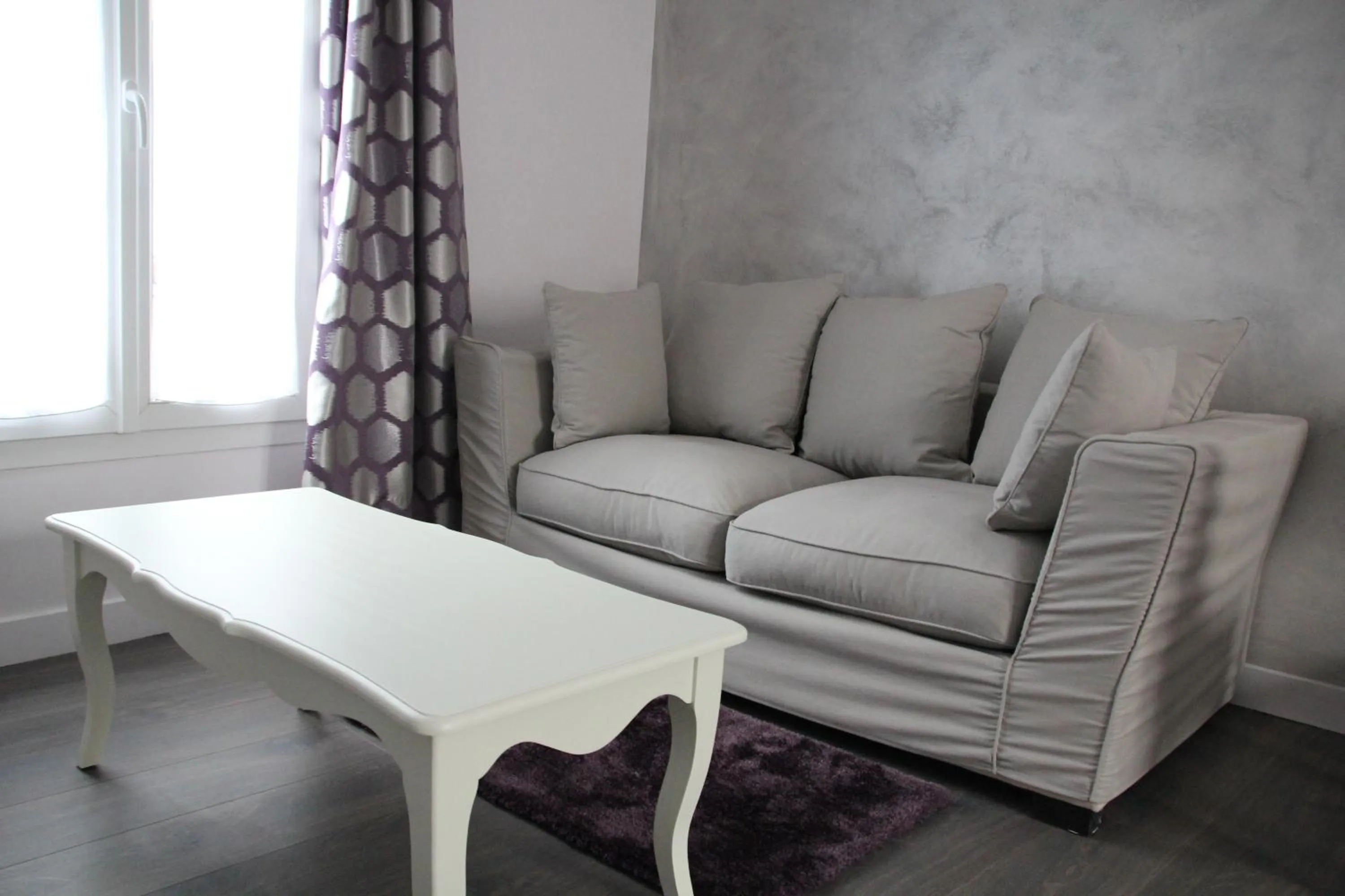 Seating area in Cosy Apparts Suresnes La Défense