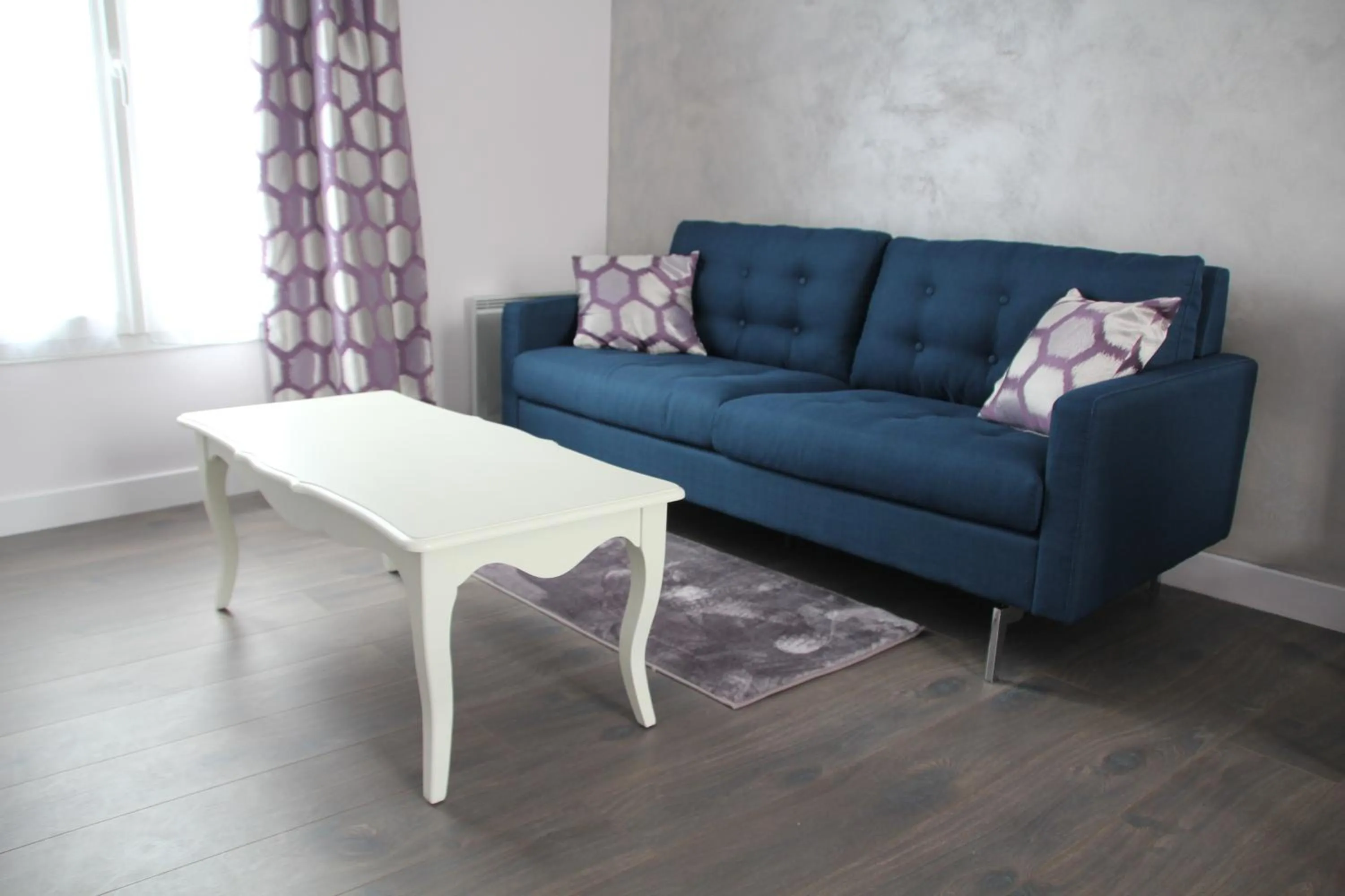 Seating area in Cosy Apparts Suresnes La Défense