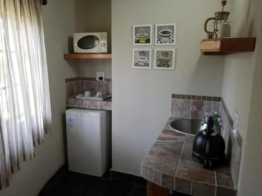 Kitchen or kitchenette in Idle & Wild Chalet