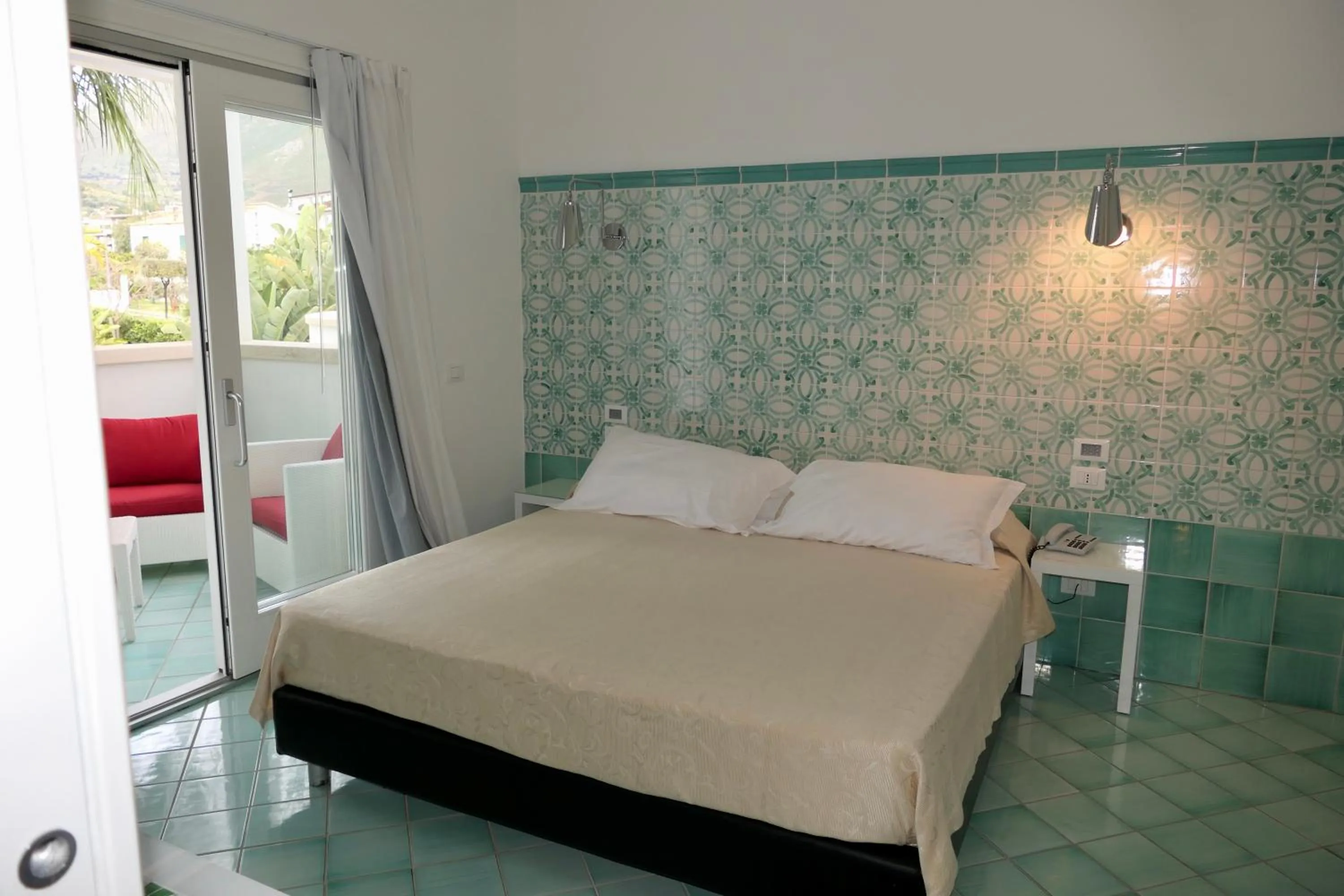 Balcony/Terrace, Bed in Ganimede Hotel