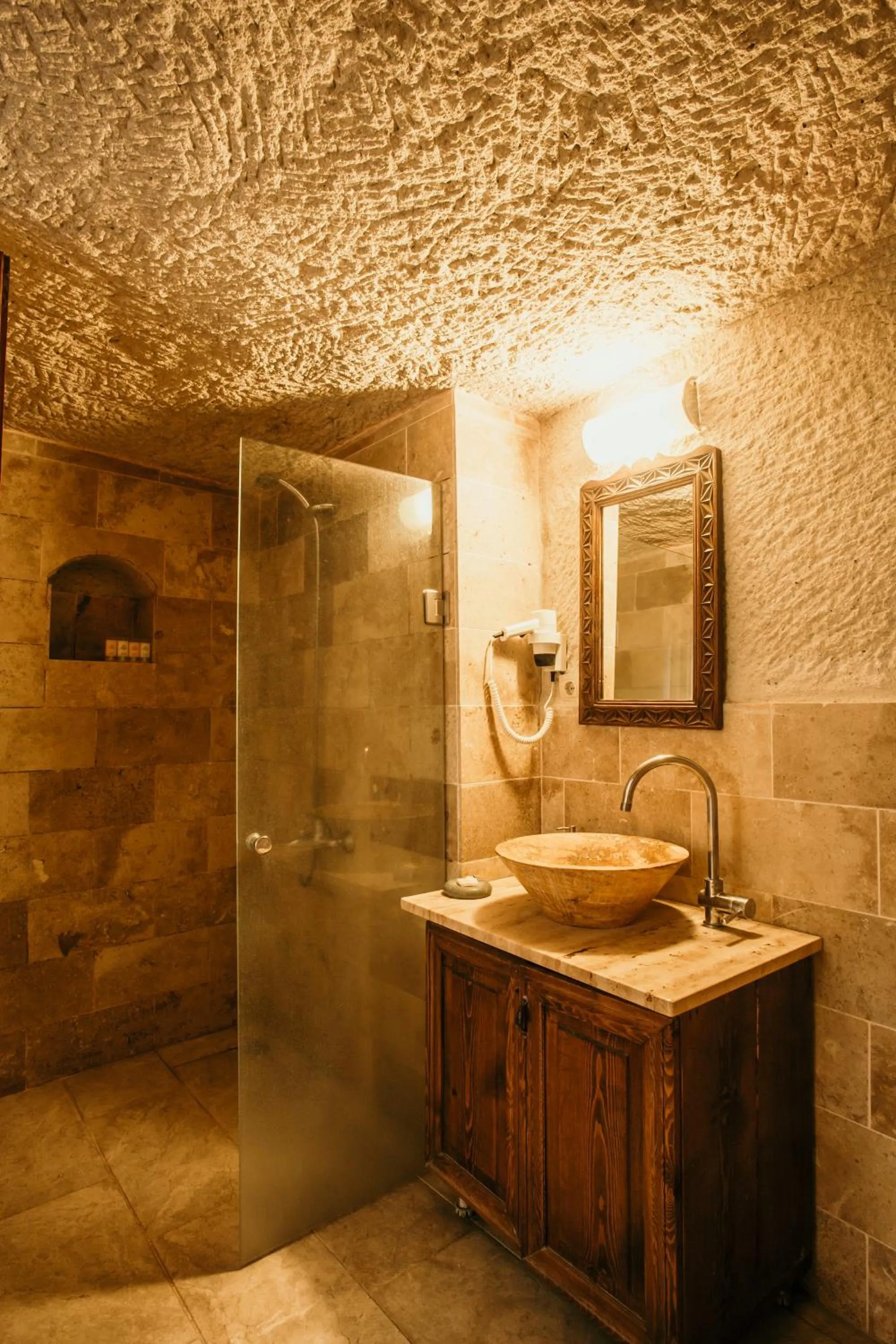 Shower in Village Cave House Hotel