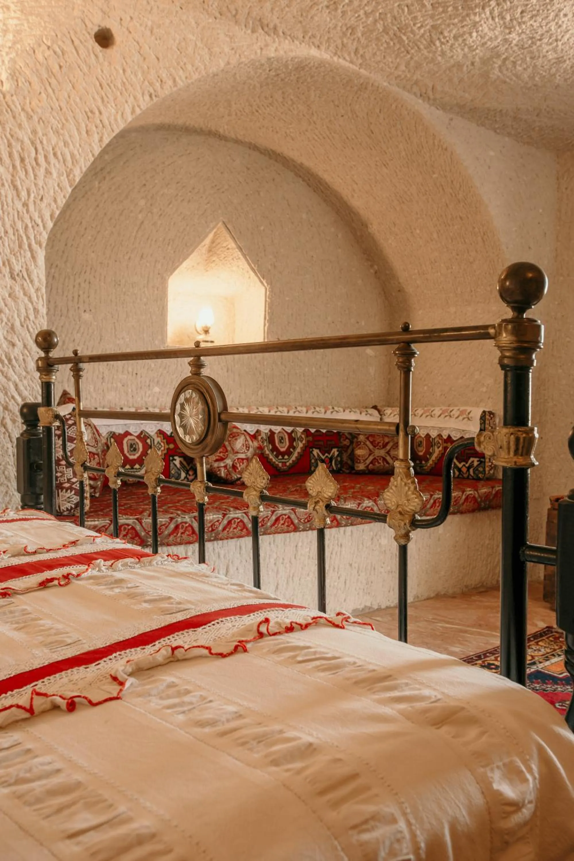 Bed in Village Cave House Hotel
