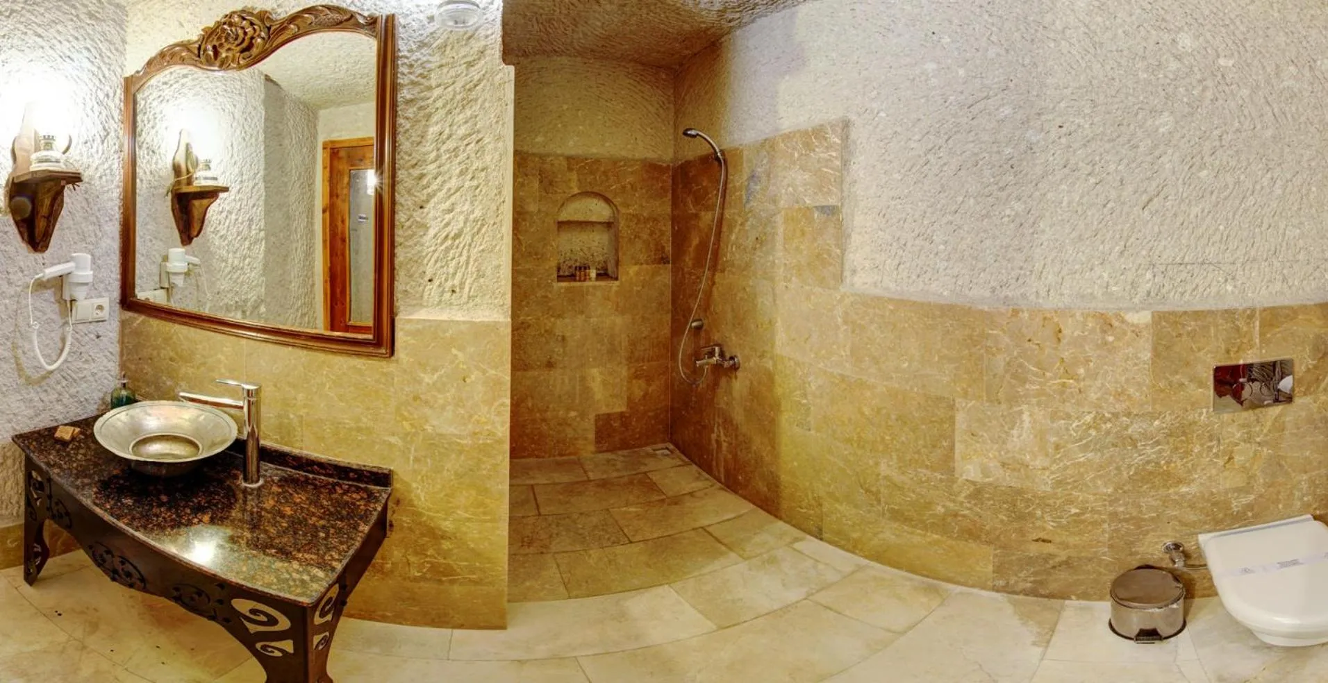 Toilet in Village Cave House Hotel