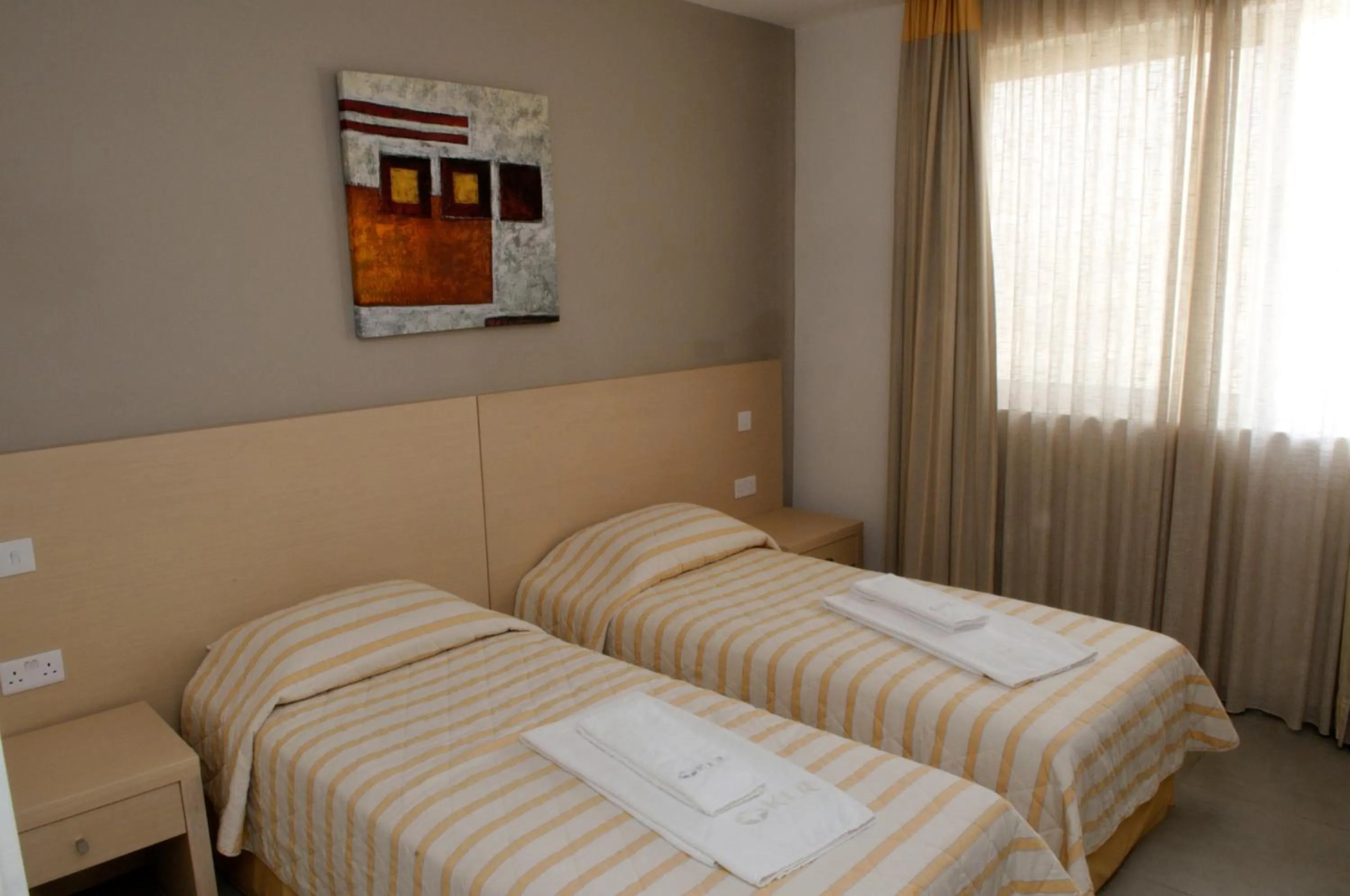 Bed in Capital Coast Resort And Spa