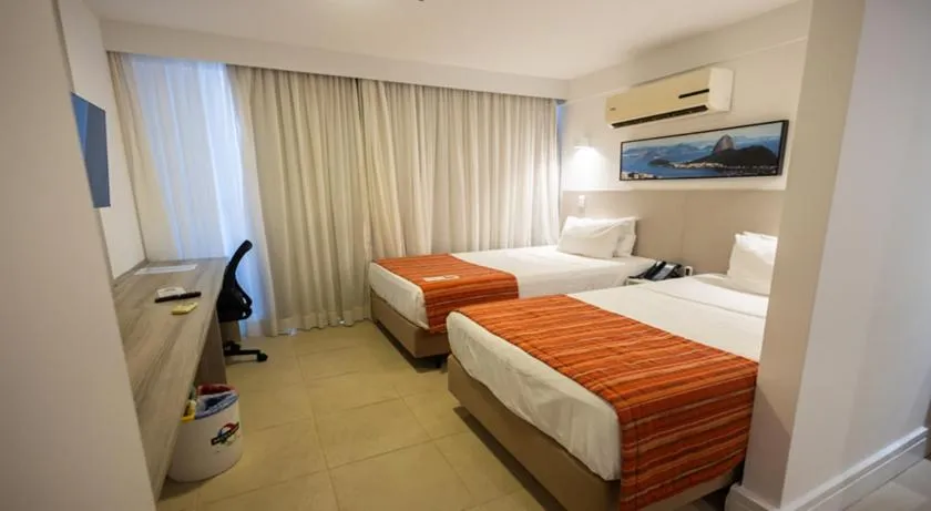 Bedroom, Bed in Ramada by Wyndham Macae Hotel & Suites