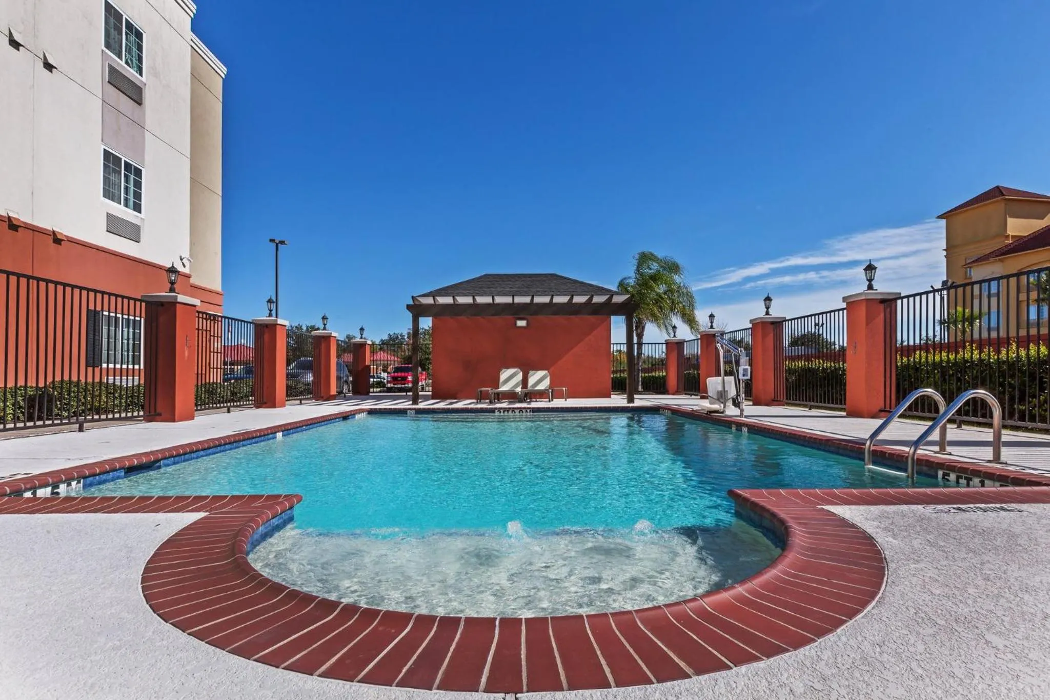 Swimming pool in Candlewood Suites Deer Park by IHG