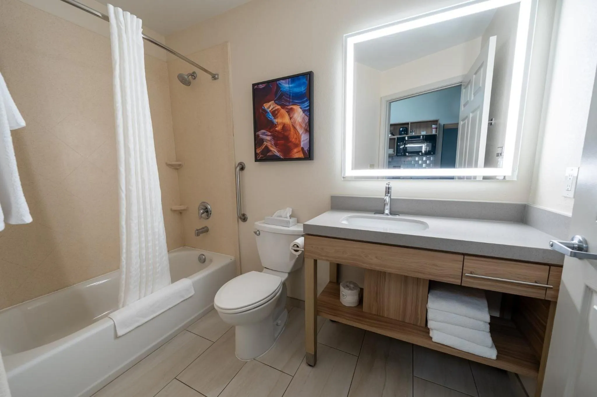 Bathroom in Candlewood Suites Deer Park by IHG