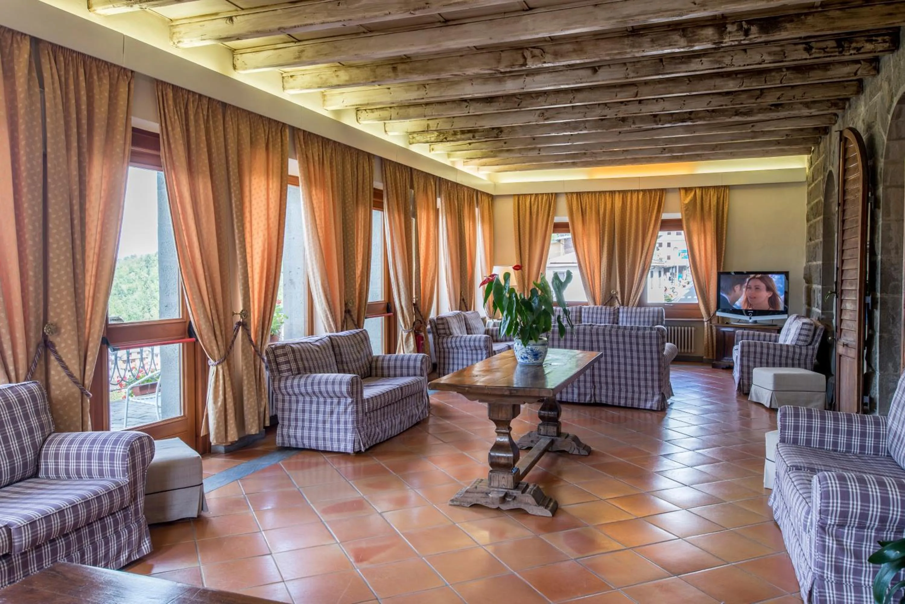 Communal lounge/ TV room in Hotel Bellavista