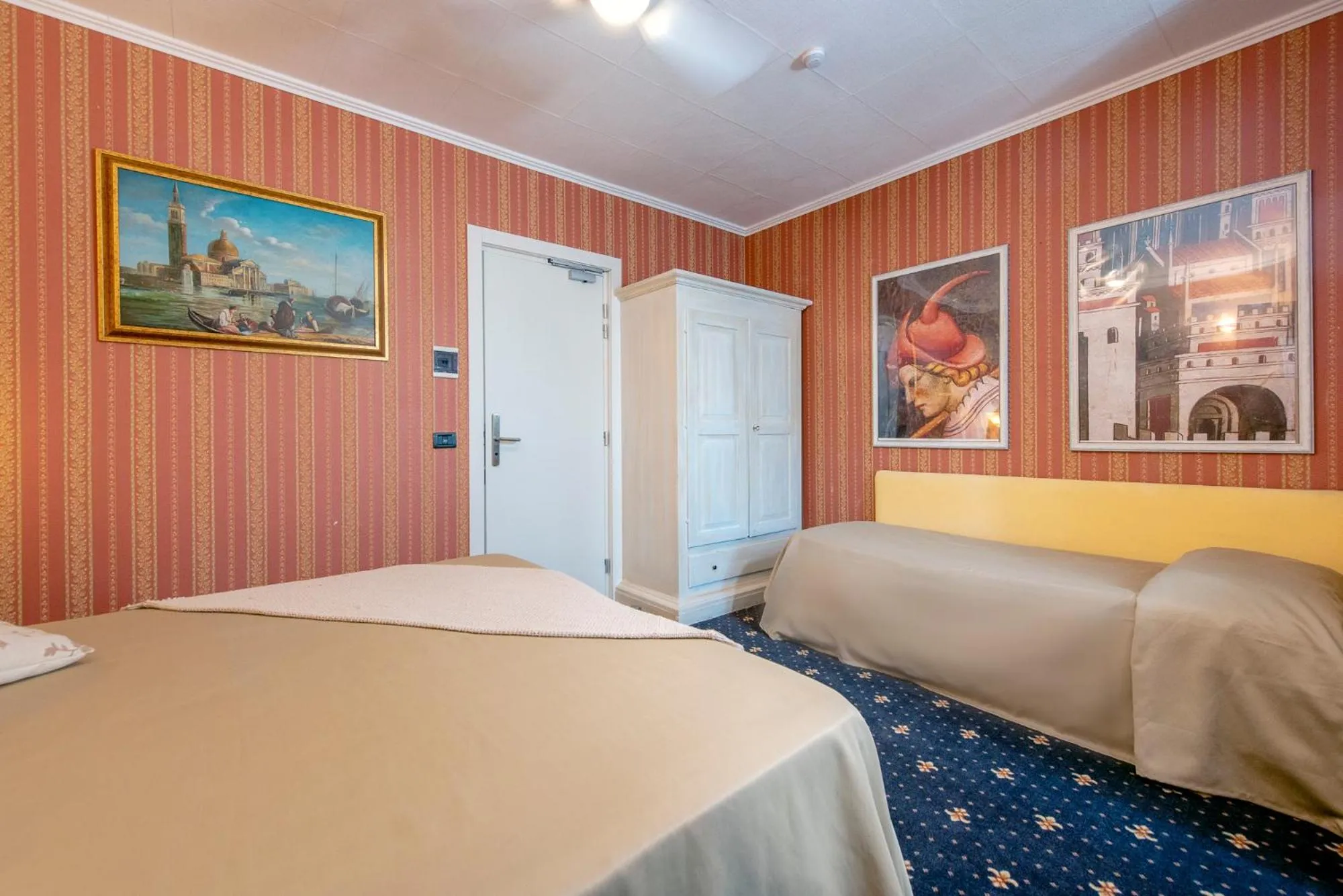 Bed in Holiday Rooms Antica Badia