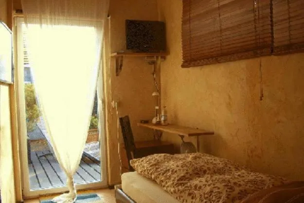 Bed in Fritzis Art Hotel