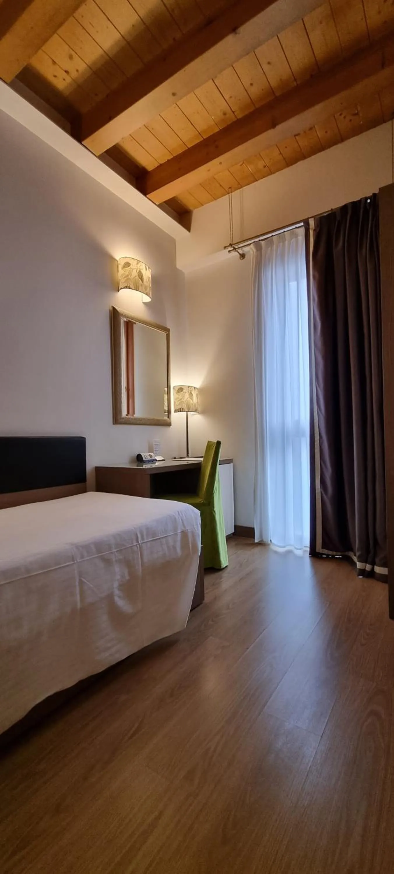 Bed in UNAHOTELS Eco Hotel Villa Costanza Venezia